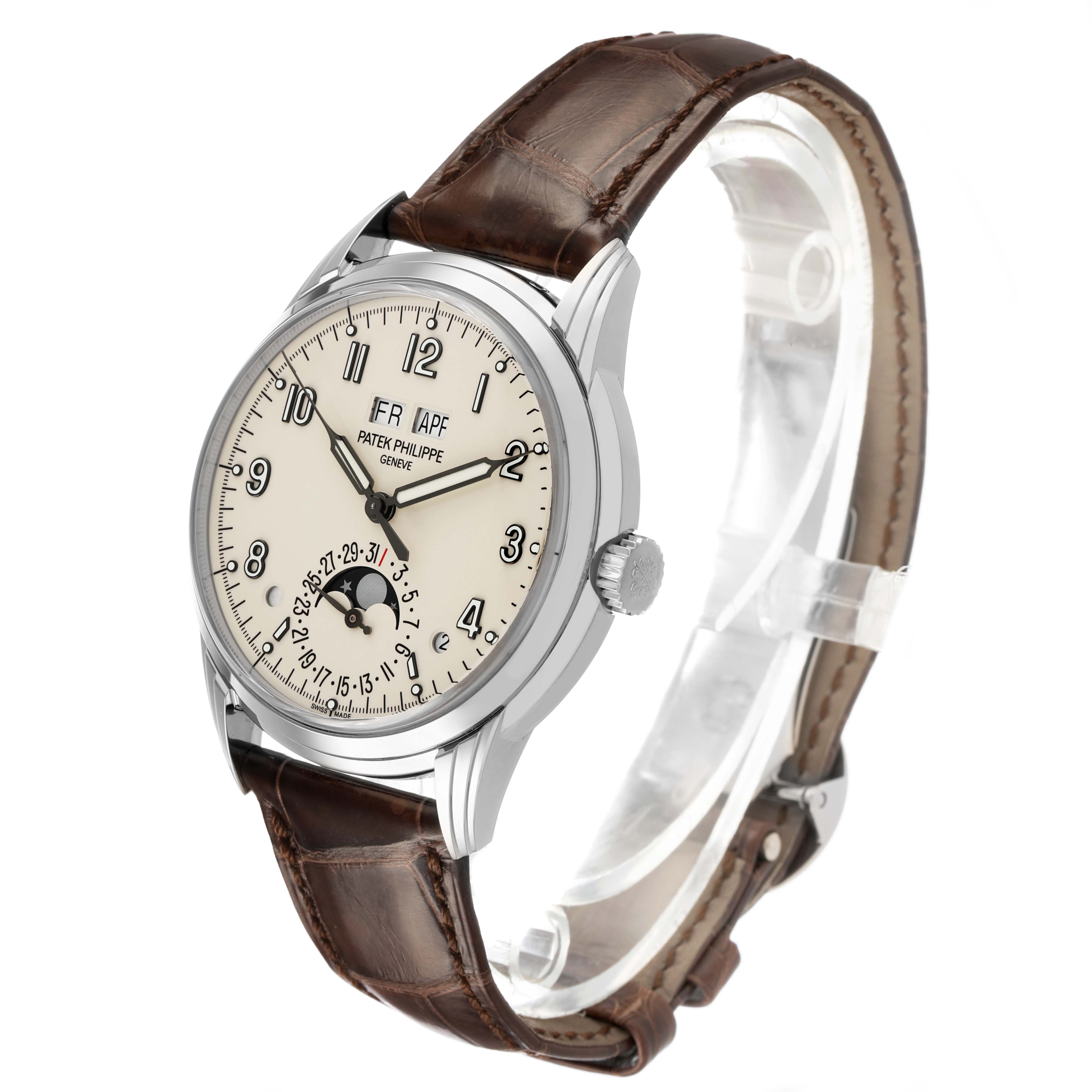 The Patek Philippe Complications 5320G-001 Men's Yellow Gold White Dial watch is shown at a slight angle, highlighting the dial, bezel, crown, and brown leather strap.