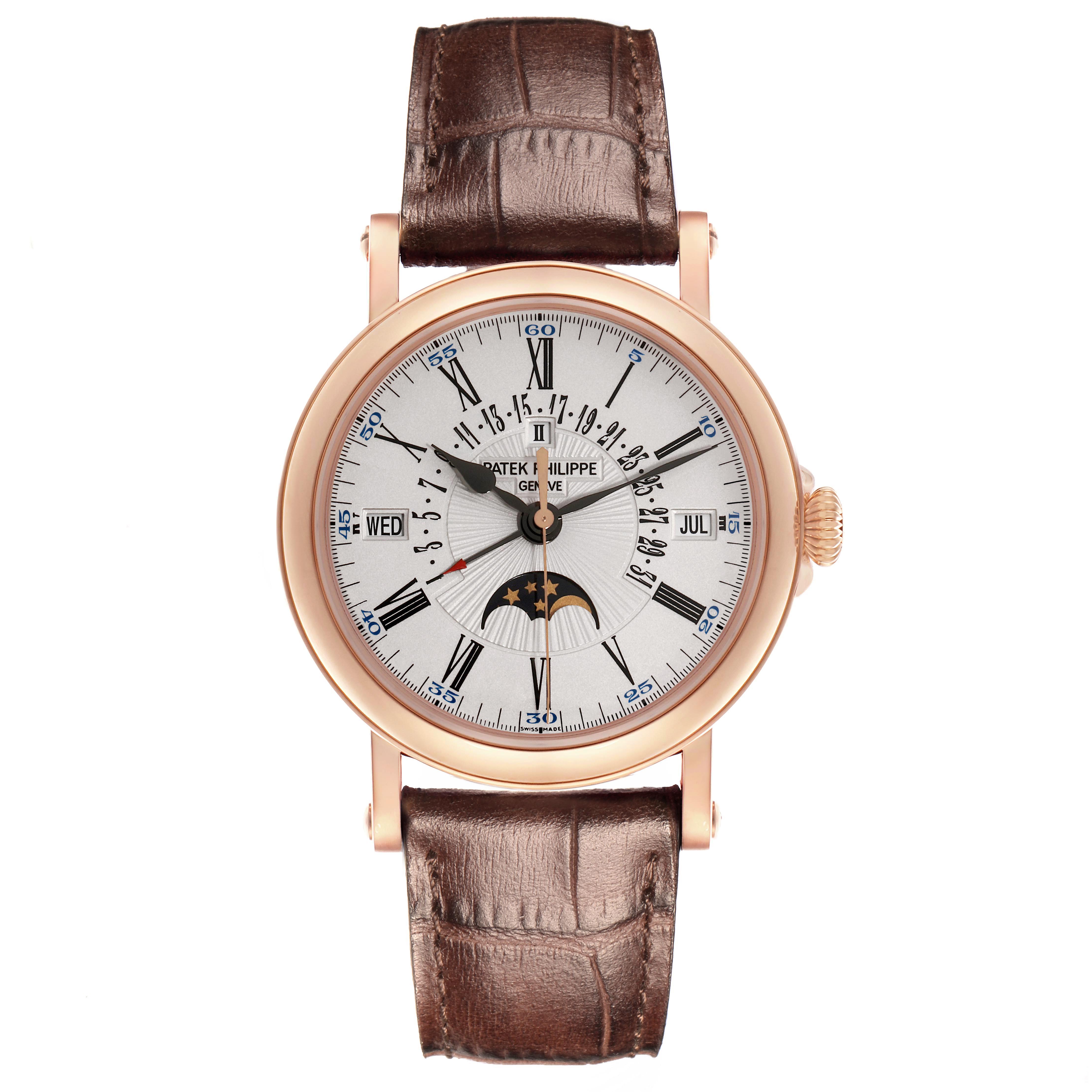 The Patek Philippe Complications 5159R Men's Rose Gold White Dial watch is shown from a front angle, displaying the dial, case, and leather strap.