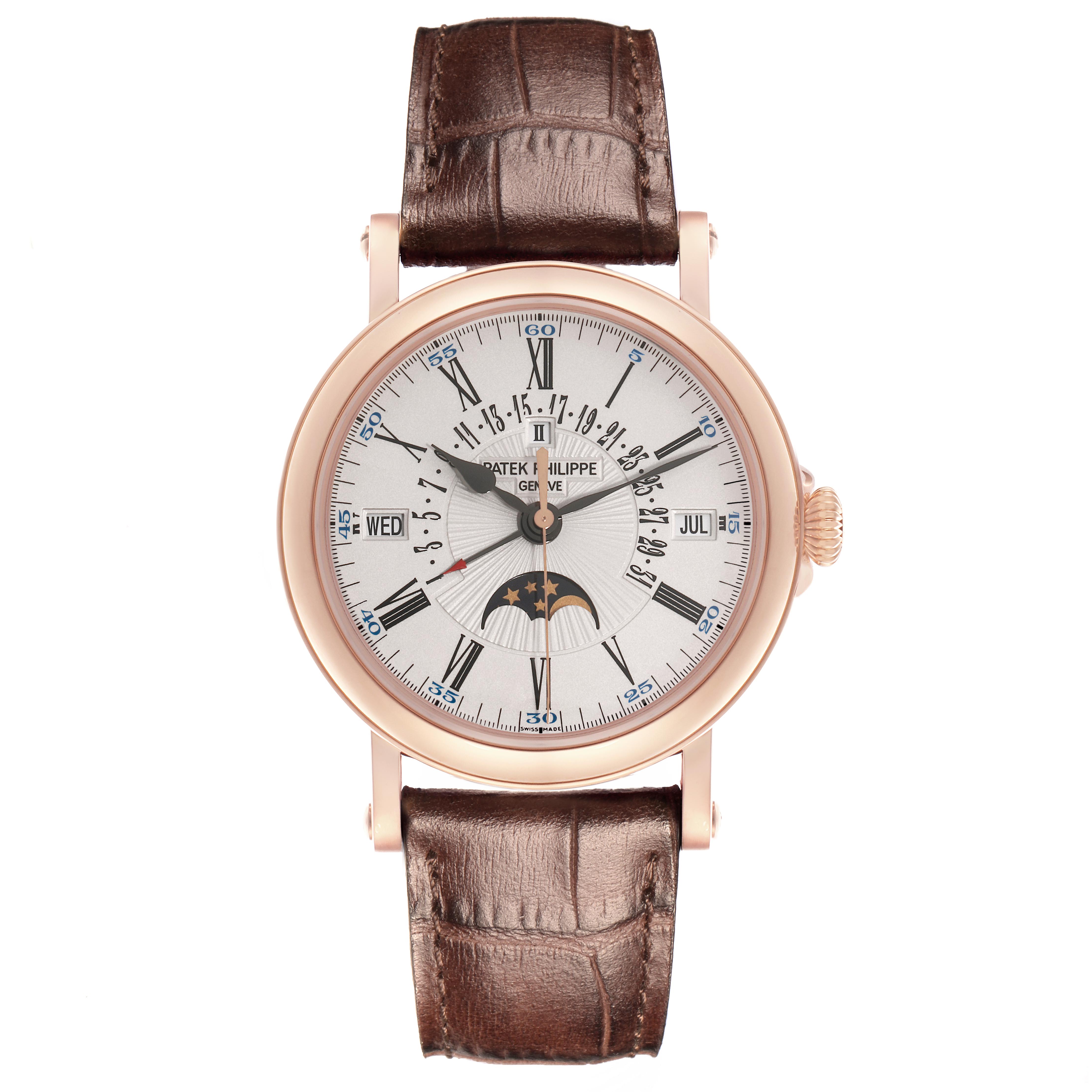 The Patek Philippe Complications 5159J-001 Men's Rose Gold White Dial 5159J-001 Men's Rose Gold White Dial watch is shown from a front angle, displaying its face, dial, and leather strap.