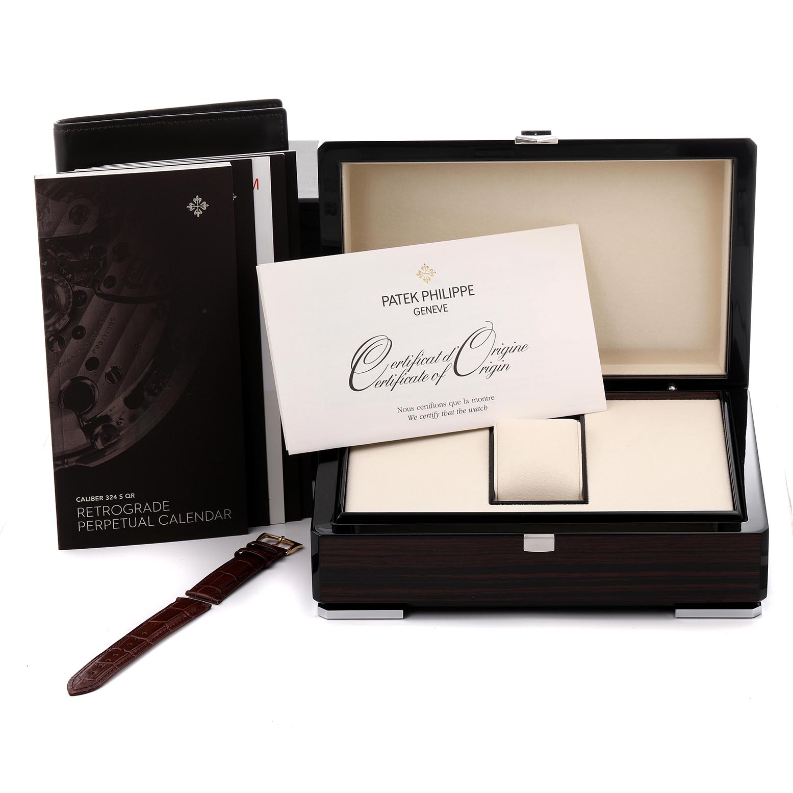 The image shows the Patek Philippe Complications 5159J-001 Men's Rose Gold White Dial 5159J-001 Men's Rose Gold White Dial packaging, certificate, manuals, and a strap, viewed from the top and front.