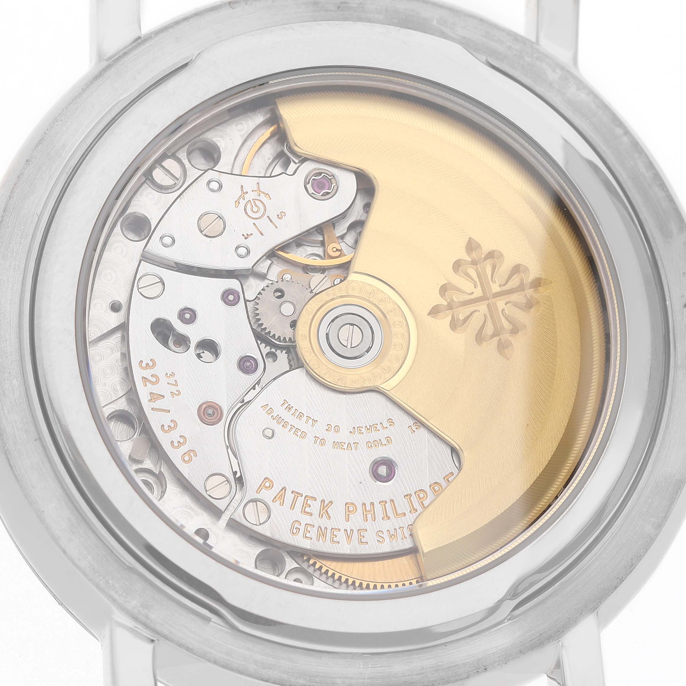 The image shows the back view of the Patek Philippe Complications 5159G-001 Men's White Gold Silver Dial watch, highlighting the movement mechanism and rotor.