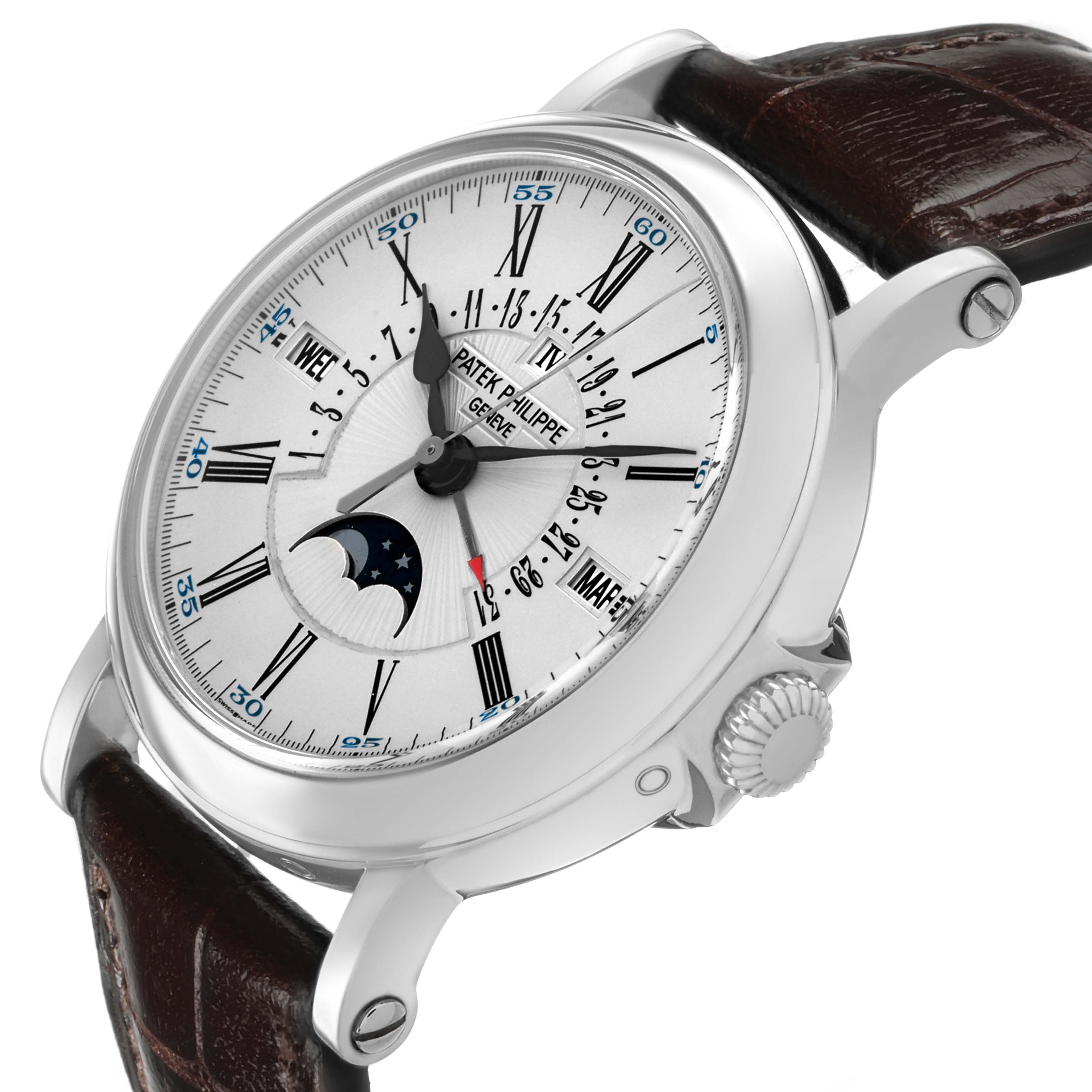 The Patek Philippe Complications 5159G-001 Men's White Gold Silver Dial watch is shown from a front-side angle, highlighting the dial, moon phase, and crown.