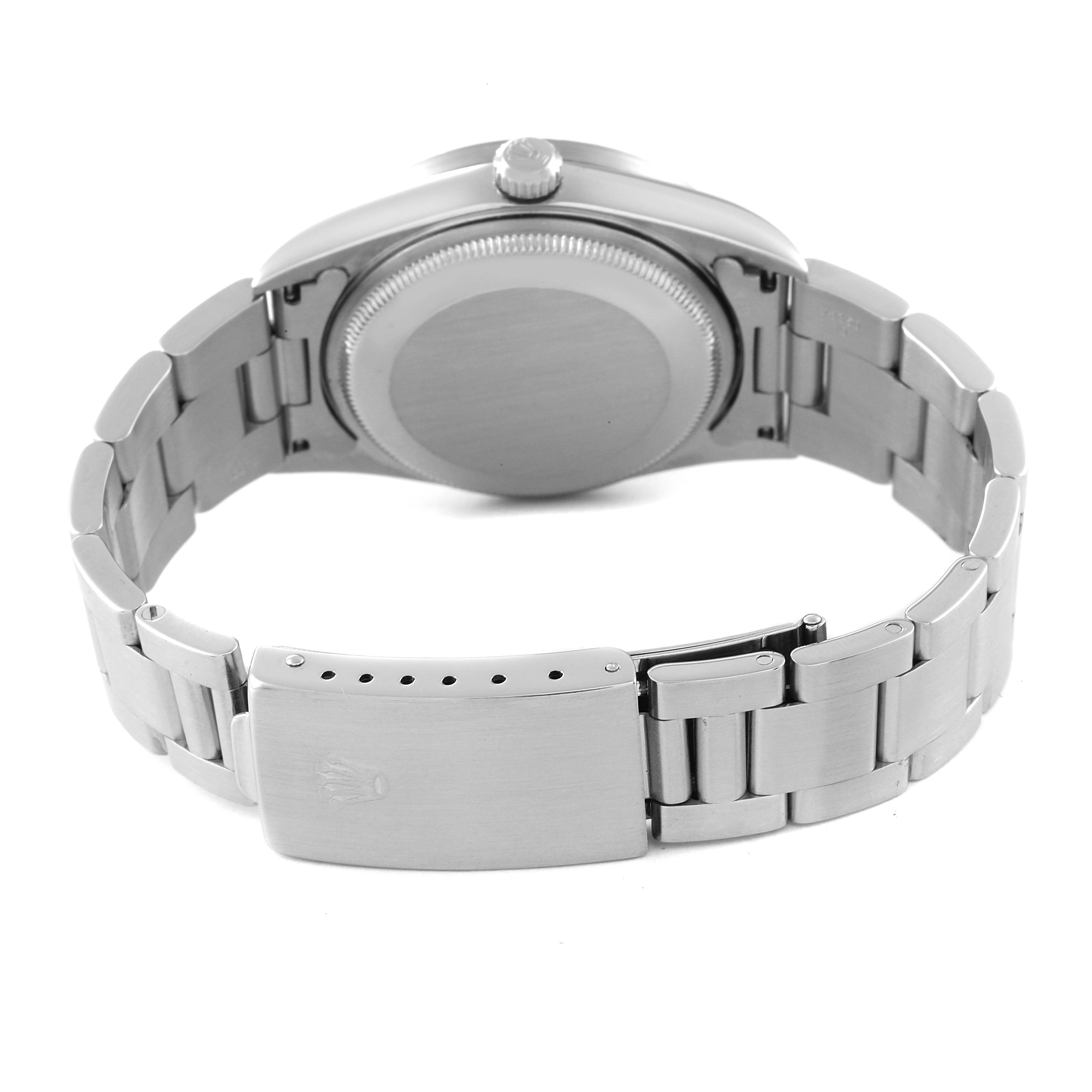 This image shows the back view of the Rolex Air-King 14010 Men's Stainless Steel Black Dial 14010 Men's Stainless Steel Black Dial watch, focusing on the closed clasp and the underside of the watch case and bracelet.