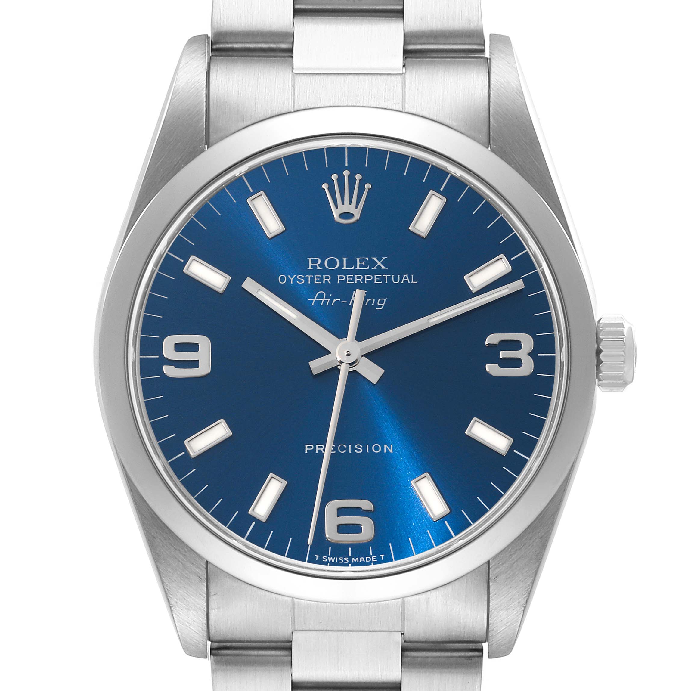 The Rolex Air-King 14000M Men's Stainless Steel Blue Dial 14000M Men's Stainless Steel Blue Dial watch is shown from a front angle, displaying its blue dial, hour markers, and bracelet.