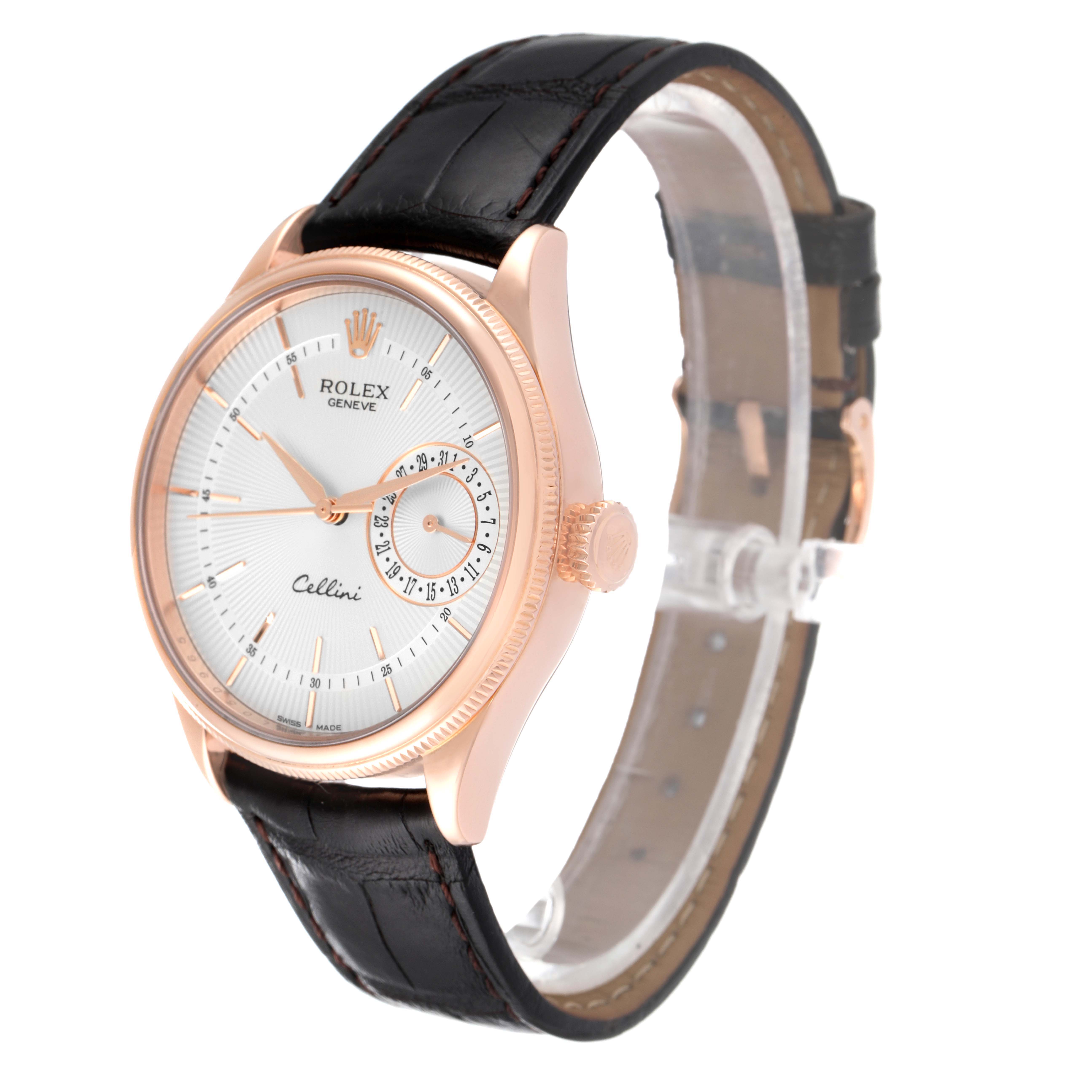 The Rolex Cellini 50515 Men's Rose Gold Silver Dial 50515 Men's Rose Gold Silver Dial watch is shown from a front-side angle, highlighting its dial, crown, and leather strap.