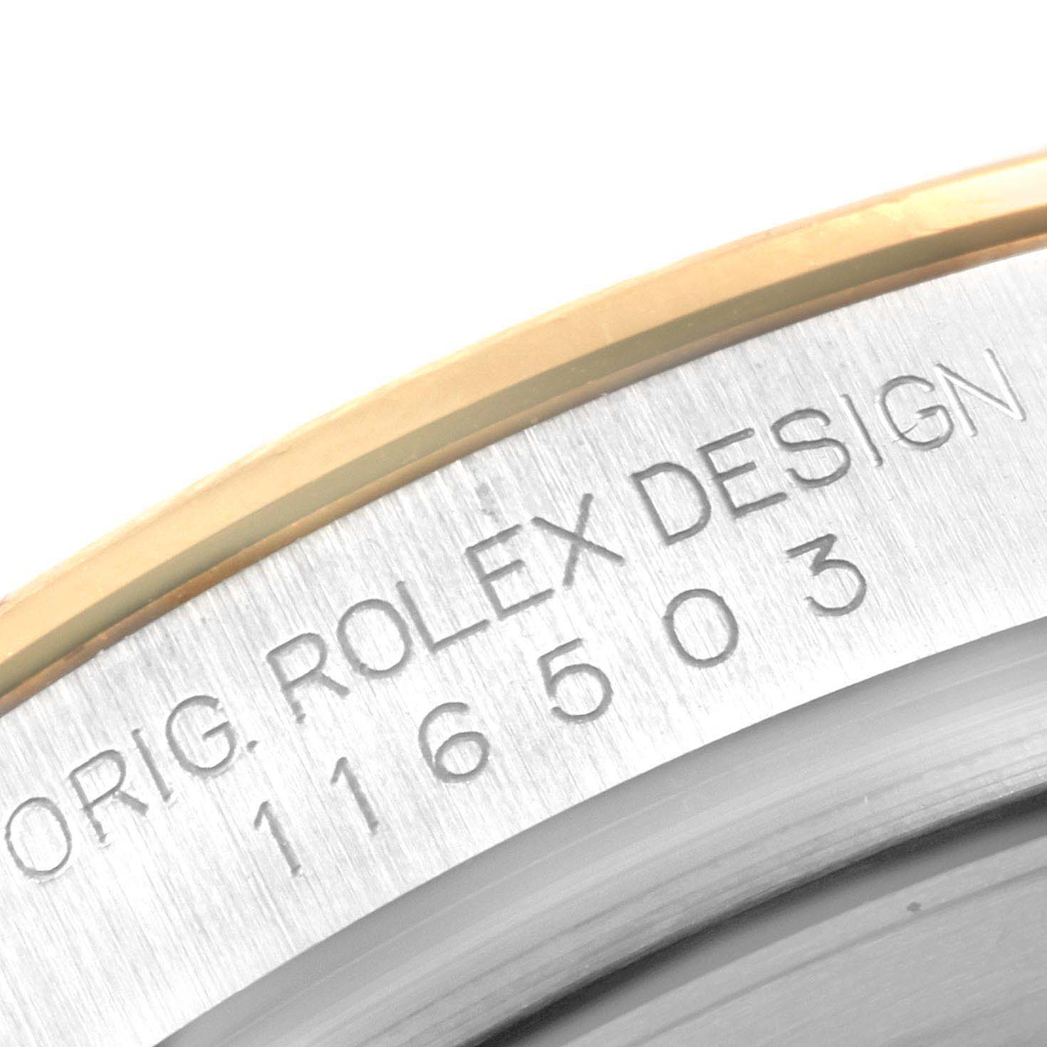 This close-up shot shows the engraved model number "116503" and "ORIG. ROLEX DESIGN" on the Rolex Daytona 116503 Men's Steel and Gold (two tone) Black Dial 116503 Men's Steel and Gold (two tone) Black Dial watch.