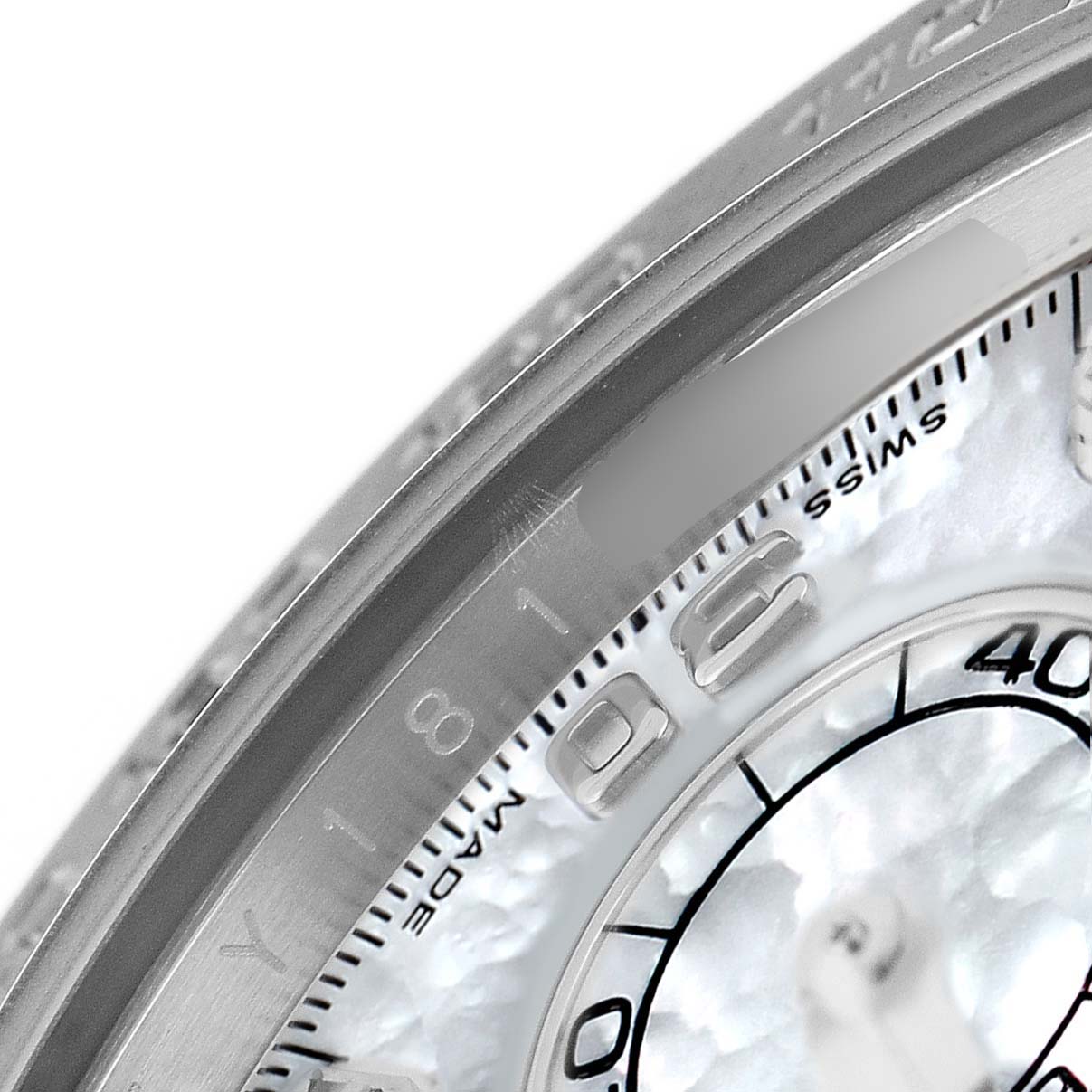 The image shows a close-up of the dial and bezel section of a Rolex Daytona 116519LN Men's White Gold Mother of Pearl Dial watch.
