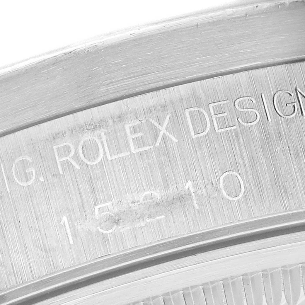 This image shows an engraved side view of the case of a Rolex Date 15210 Men
s Stainless Steel Black Dial 15210 Men
s Stainless Steel Black Dial model watch, displaying the model number and brand name.