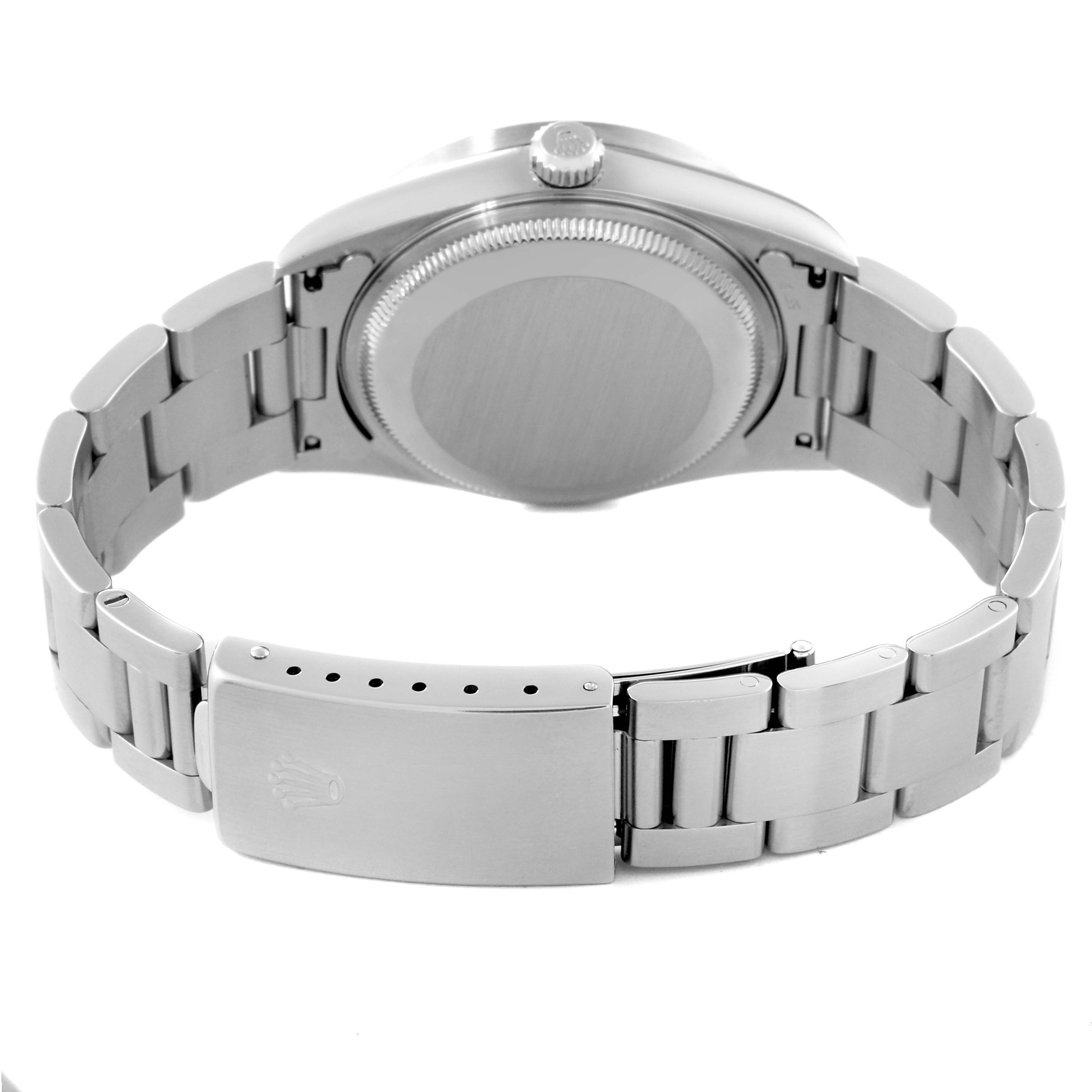 The image shows the back and bracelet of the Rolex Date 15210 Men
s Stainless Steel Black Dial 15210 Men
s Stainless Steel Black Dial model watch, highlighting its clasp and case back.