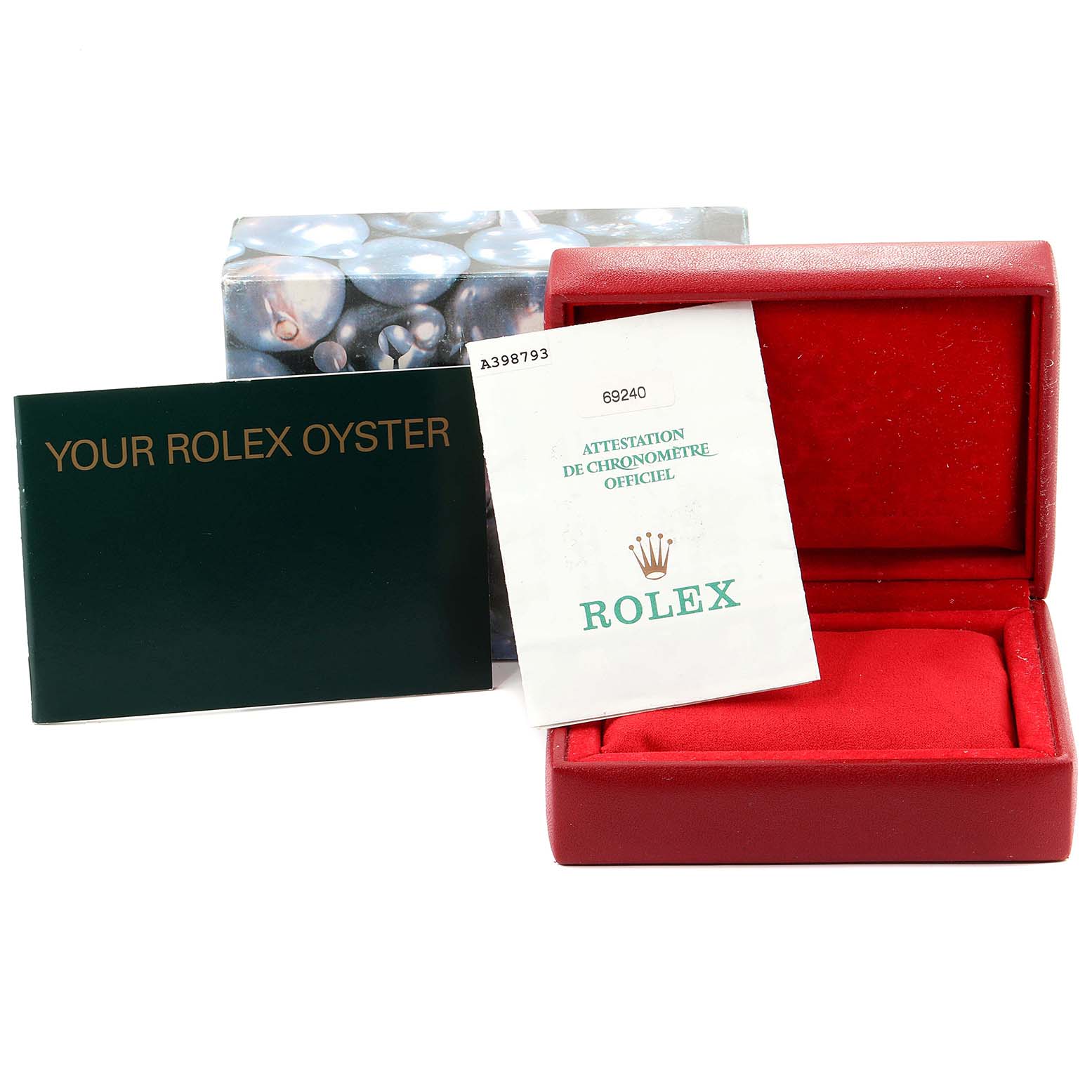 The image displays a Rolex Date 69240 Women
s Stainless Steel Blue Dial 69240 Women
s Stainless Steel Blue Dial model watch box, guarantee booklet, and chronometer certification.