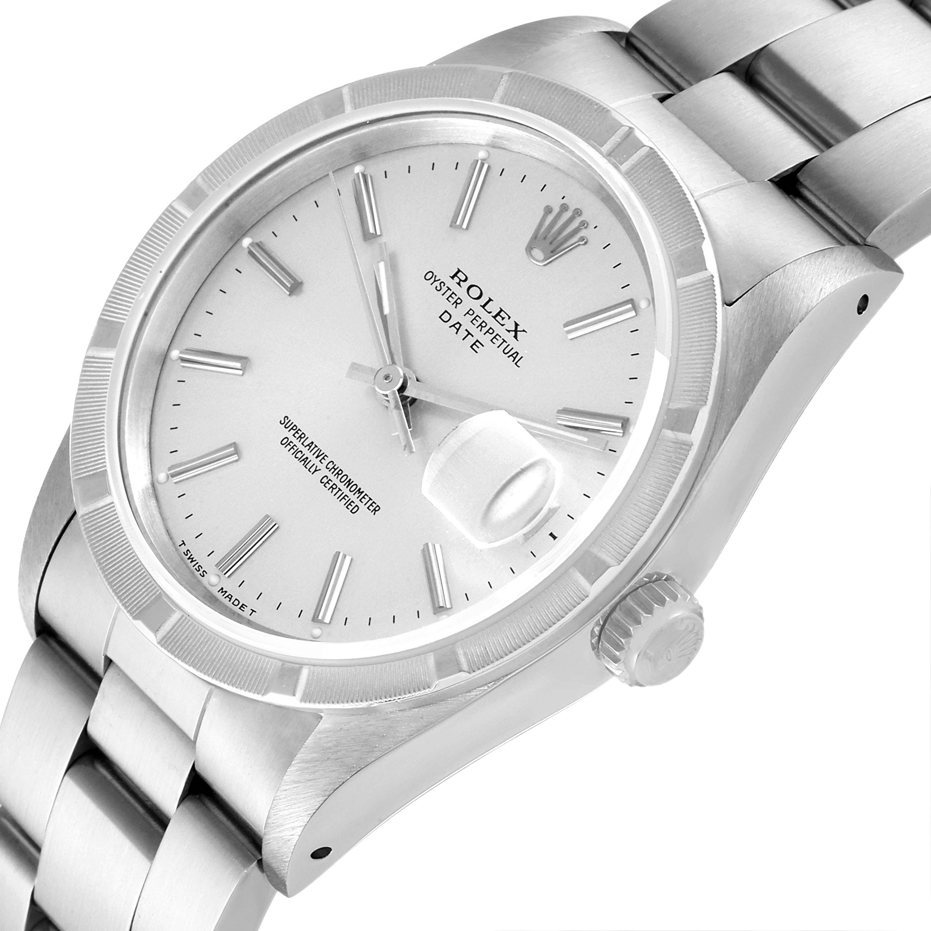This image shows an angled view of a Rolex Date 15210 Men's Stainless Steel Silver Dial 15210 Men's Stainless Steel Silver Dial model watch, displaying the dial, bezel, crown, and part of the bracelet.