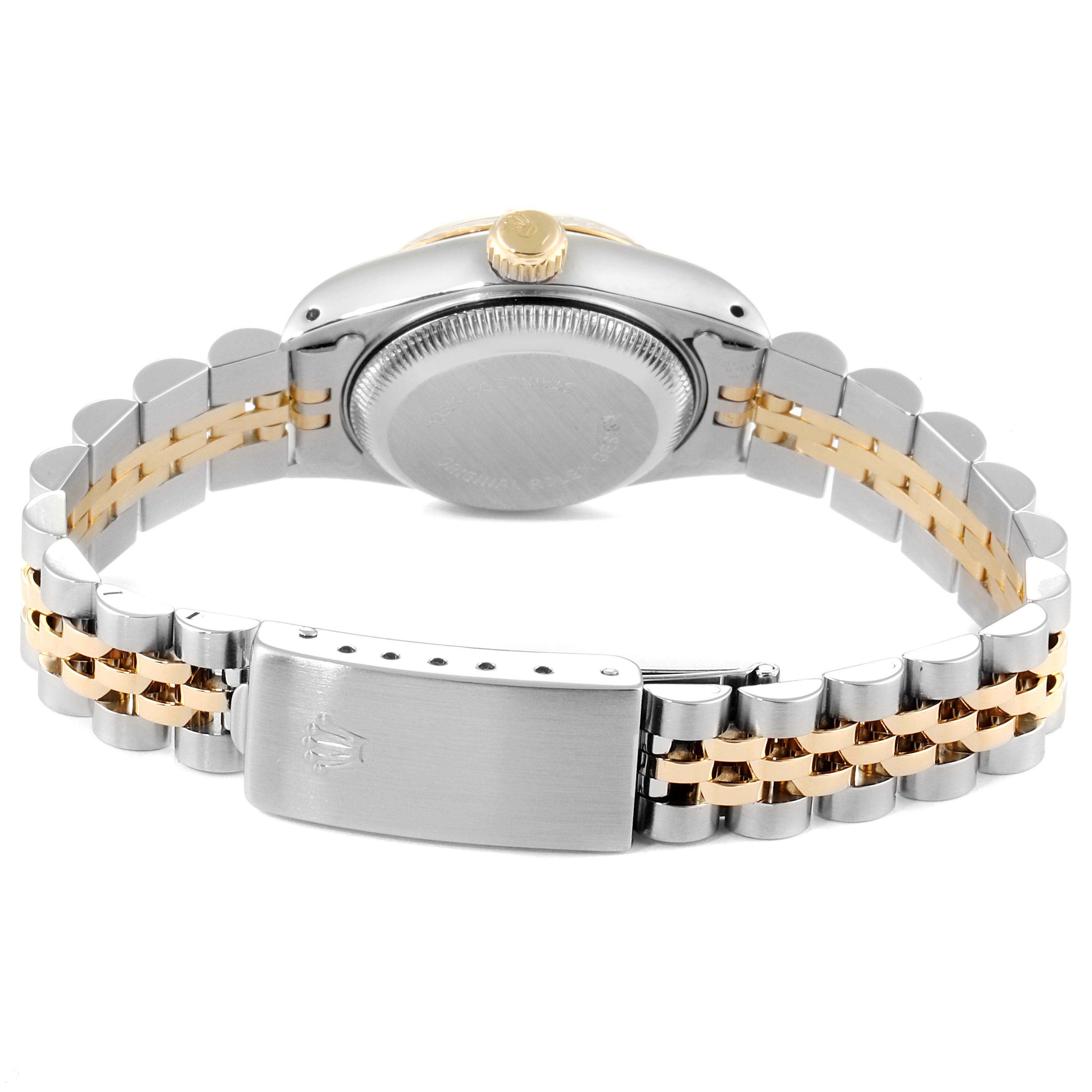 The image shows the back view of a Rolex Datejust 69173 Women's Steel and Gold (two tone) Champagne Dial 69173 Women's Steel and Gold (two tone) Champagne Dial model watch, focusing on the case back, crown, and two-tone bracelet with a clasp.