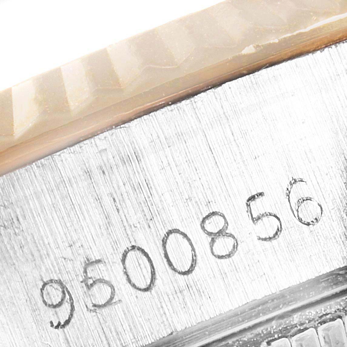 This image shows a close-up of the serial number engraved on the case of a Rolex Datejust 69173 Women's Steel and Gold (two tone) Champagne Dial 69173 Women's Steel and Gold (two tone) Champagne Dial watch.