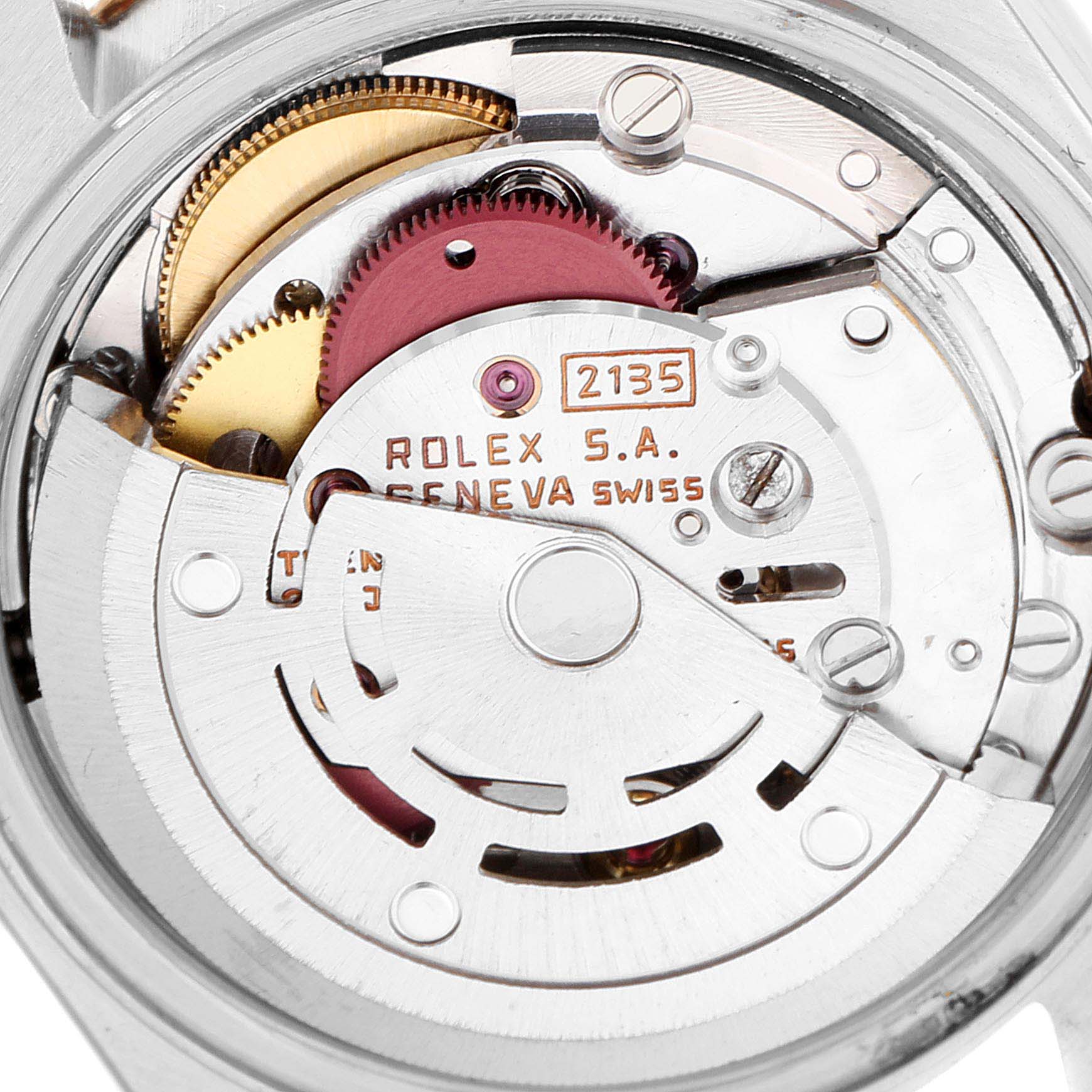 The image shows the internal mechanism of a Rolex Datejust 69173 Women's Steel and Gold (two tone) Champagne Dial 69173 Women's Steel and Gold (two tone) Champagne Dial watch, highlighting its gears and rotor from a top-down angle.
