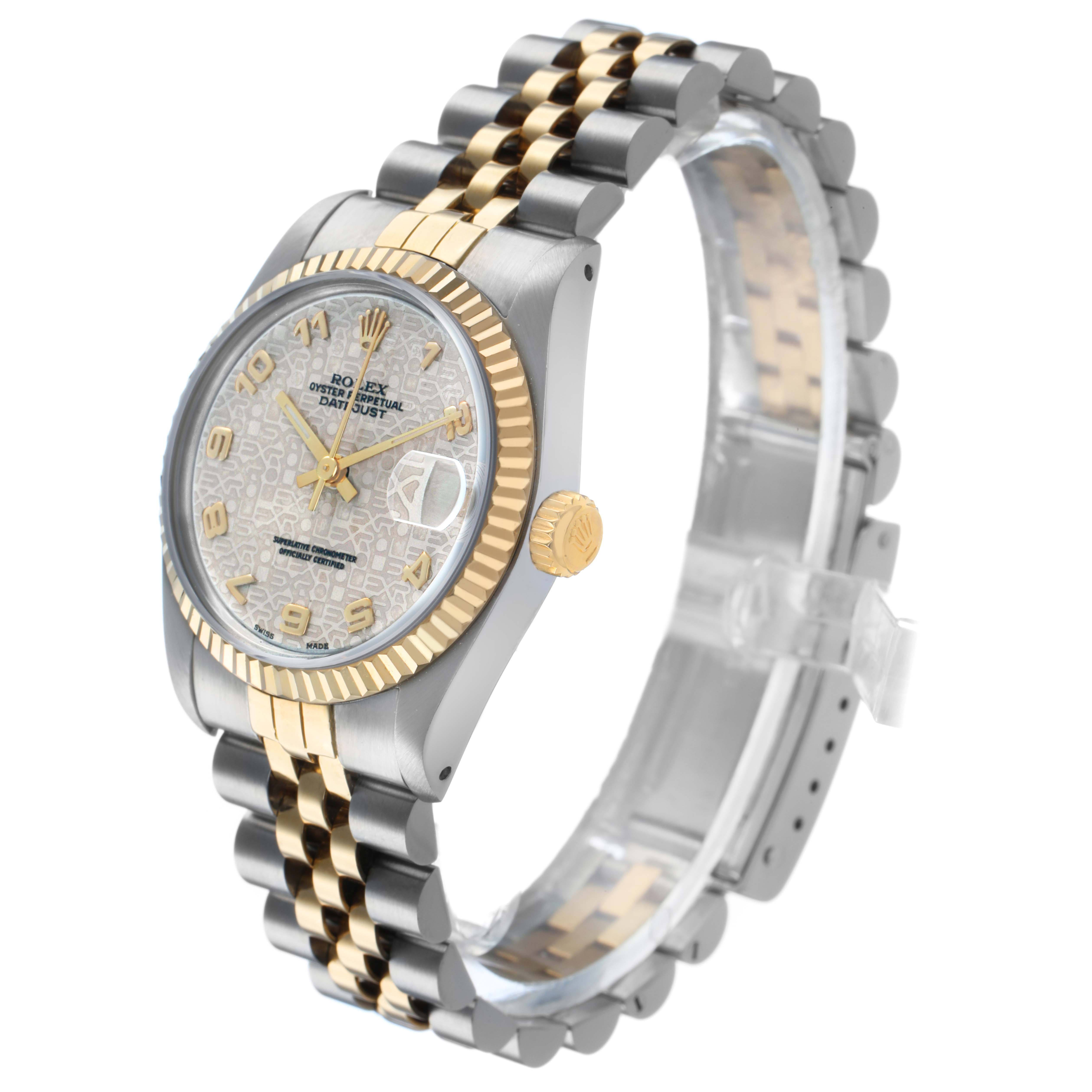 The Rolex Mid-Size 68273 Women's Steel and Gold (two tone) White Dial watch is viewed at an angle showcasing the face, bezel, crown, and two-tone bracelet.