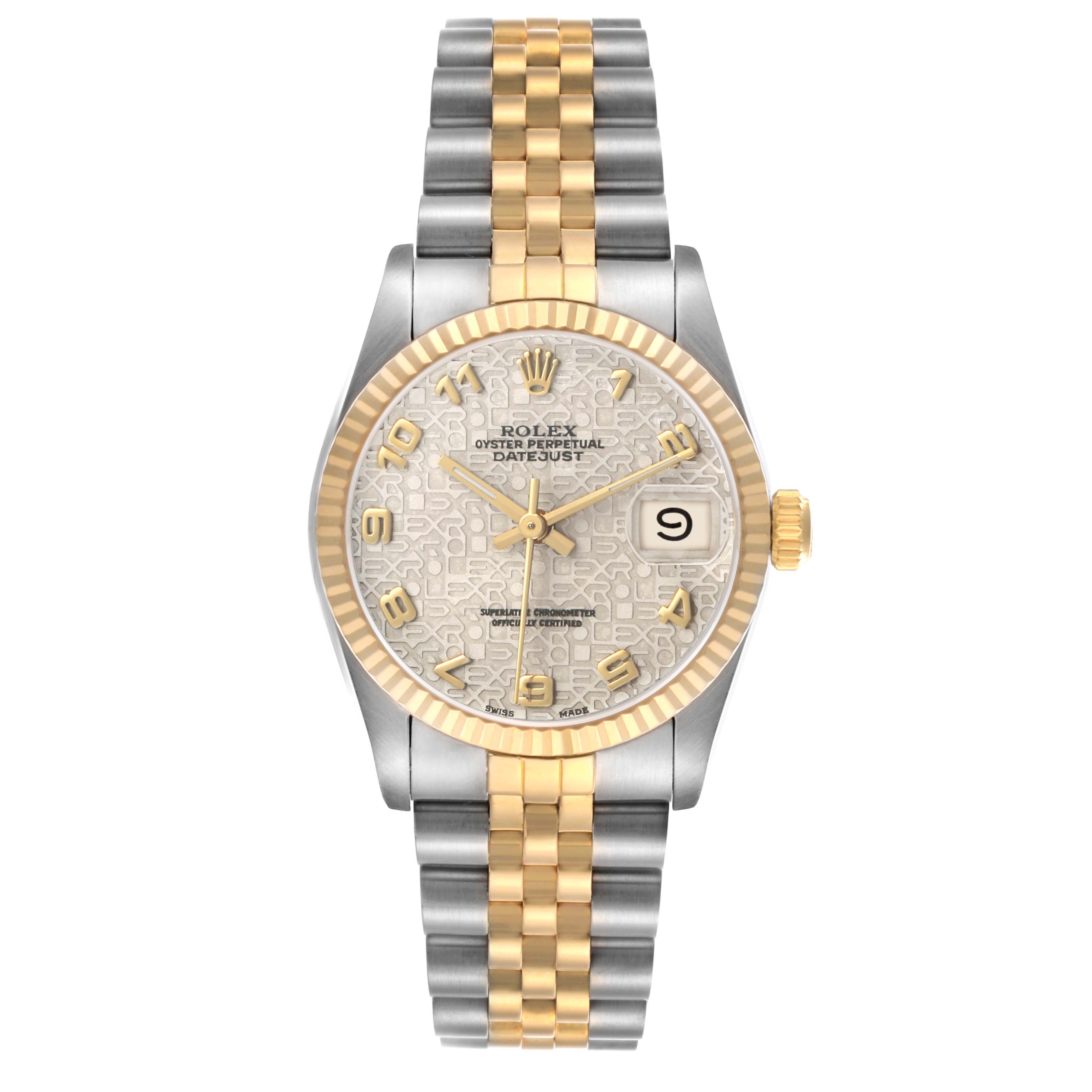 The Rolex Mid-Size 68273 Women's Steel and Gold (two tone) White Dial model is shown from the front, highlighting its fluted bezel, jubilee bracelet, and date window.