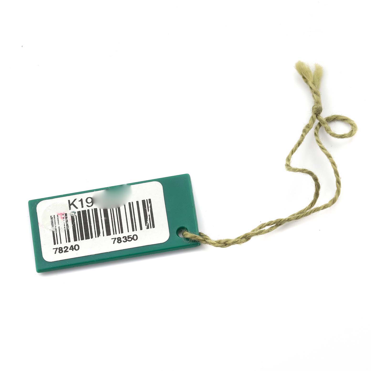 The image shows a Rolex Mid-Size 78240 Women's Stainless Steel Pink Dial 78240 Women's Stainless Steel Pink Dial model green tag with a barcode and string, viewed from above.