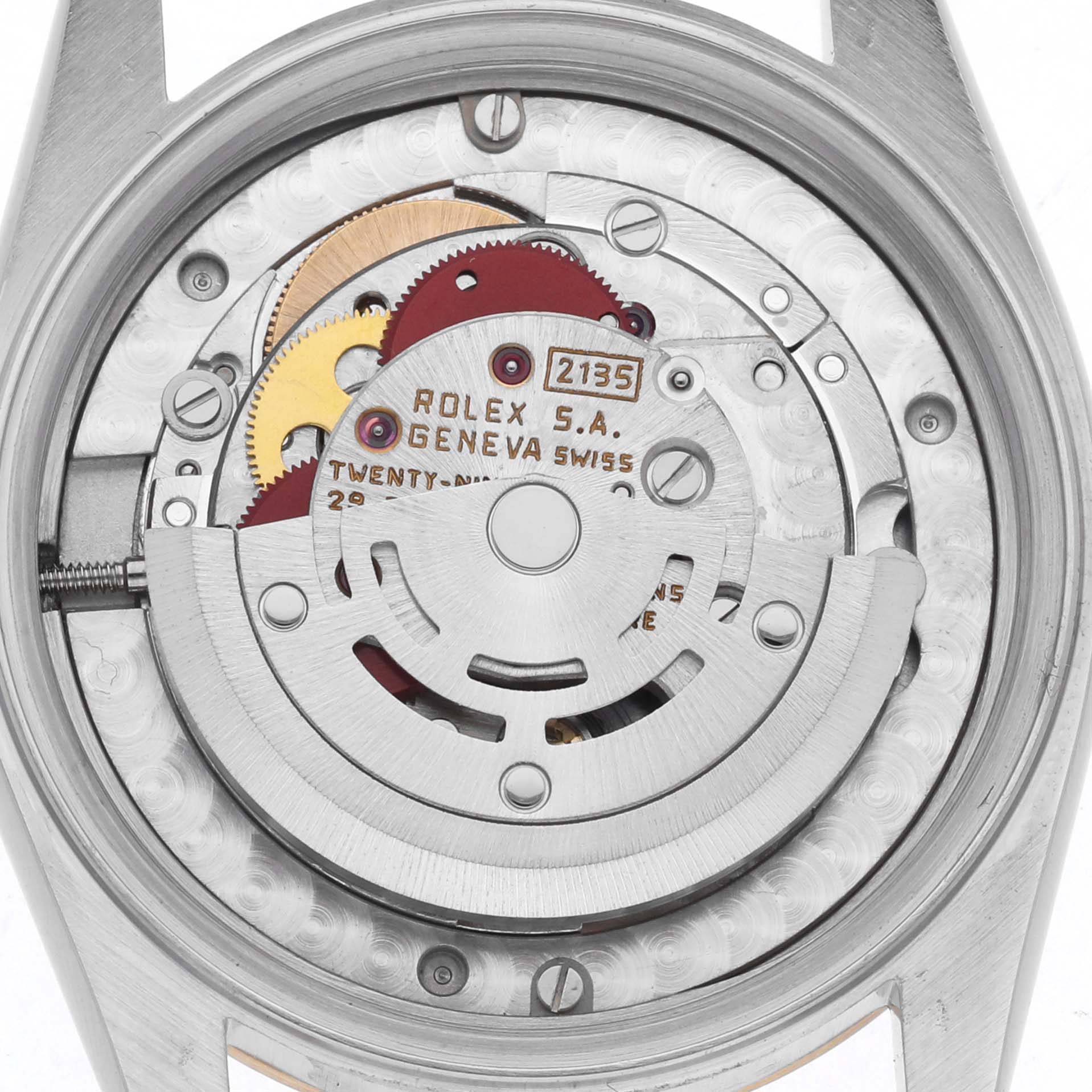 This image shows the back view of a Rolex Mid-Size 68273 Women's Steel and Gold (two tone) Champagne Dial 68273 Women's Steel and Gold (two tone) Champagne Dial watch, highlighting its intricate mechanical movement and rotor.