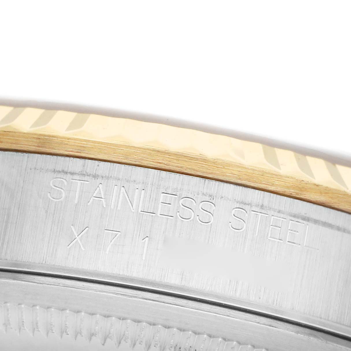 The image shows a close-up of the Rolex Datejust 16233 Men's Steel and Gold (two tone) Champagne Dial, focusing on the stainless steel case side with engraving details.