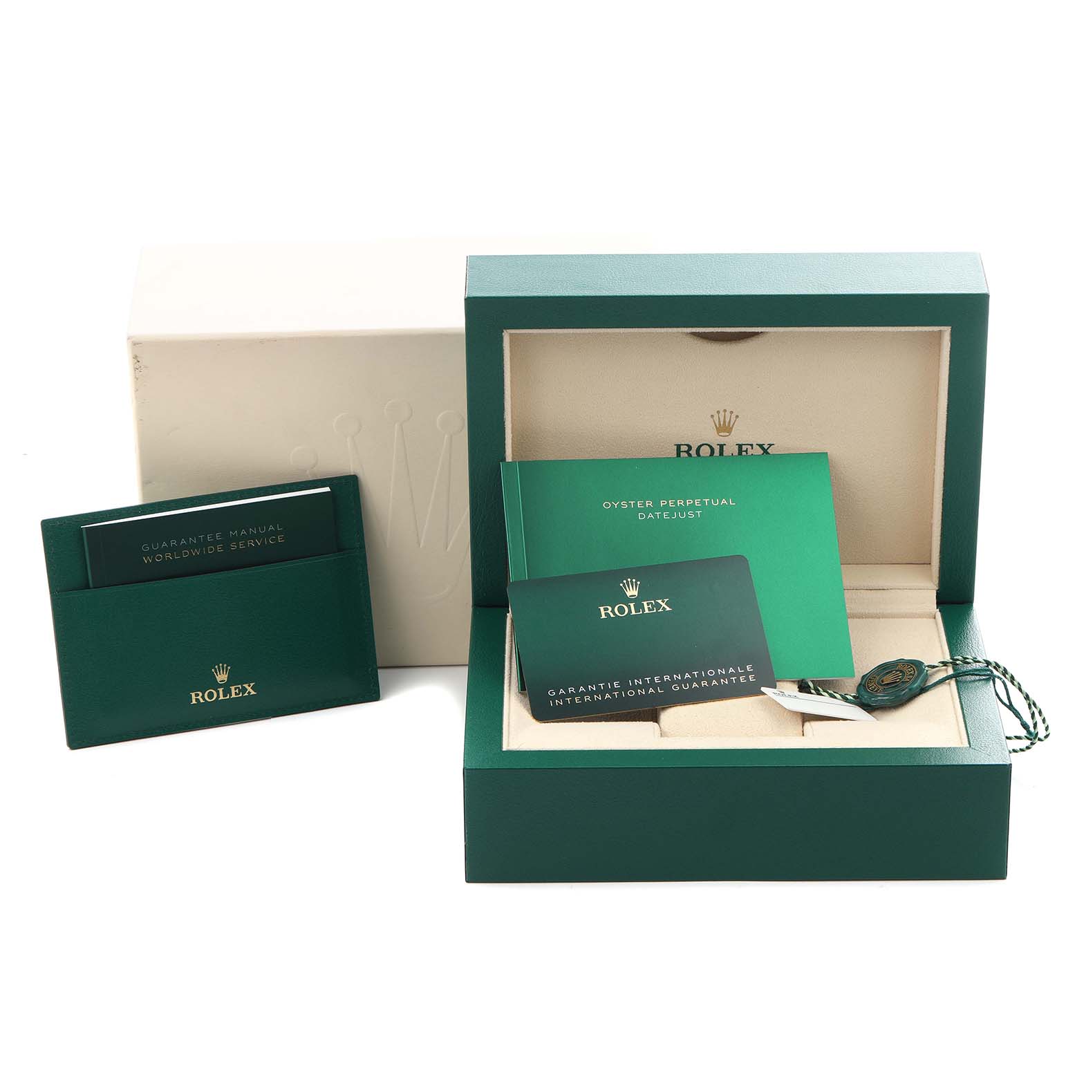 The image shows packaging and documentation for a Rolex Datejust 41 126334 Men's Stainless Steel Grey Dial 126334 Men's Stainless Steel Grey Dial, including manuals, guarantee card, and green boxes.