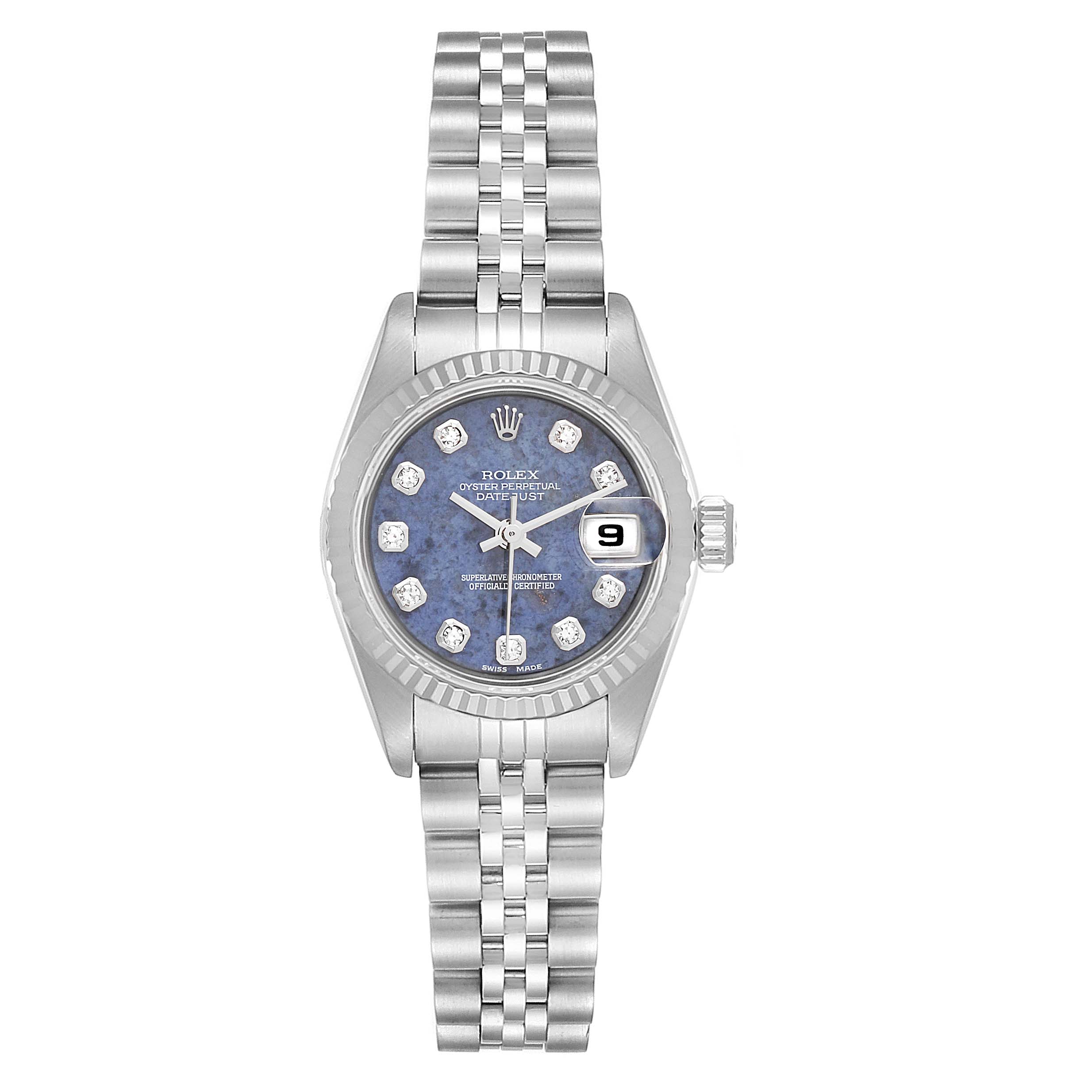 The Rolex Datejust 79174 Women
s Stainless Steel Blue Dial 79174 Women
s Stainless Steel Blue Dial watch is shown from a front angle, featuring its face, bracelet, case, and crown.
