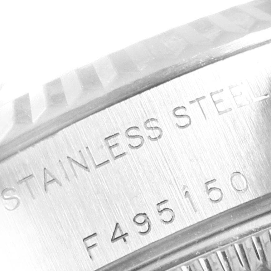 This image shows a close-up of the case back edge, showing the serial number and material marking on the Rolex Datejust 79174 Women
s Stainless Steel Blue Dial 79174 Women
s Stainless Steel Blue Dial watch.