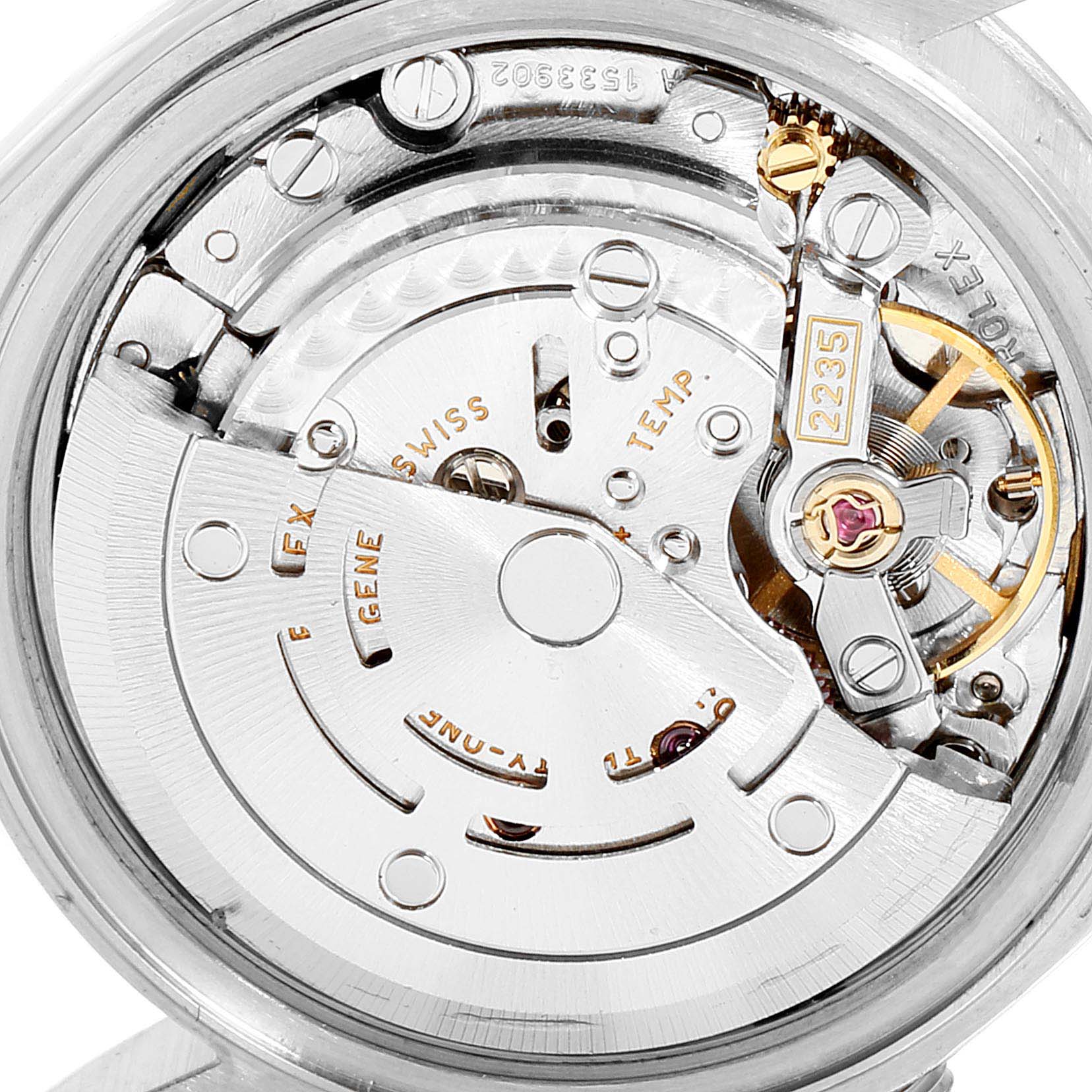 The image shows the intricate inner movement mechanism of a Rolex Datejust 79174 Women
s Stainless Steel Blue Dial 79174 Women
s Stainless Steel Blue Dial watch.