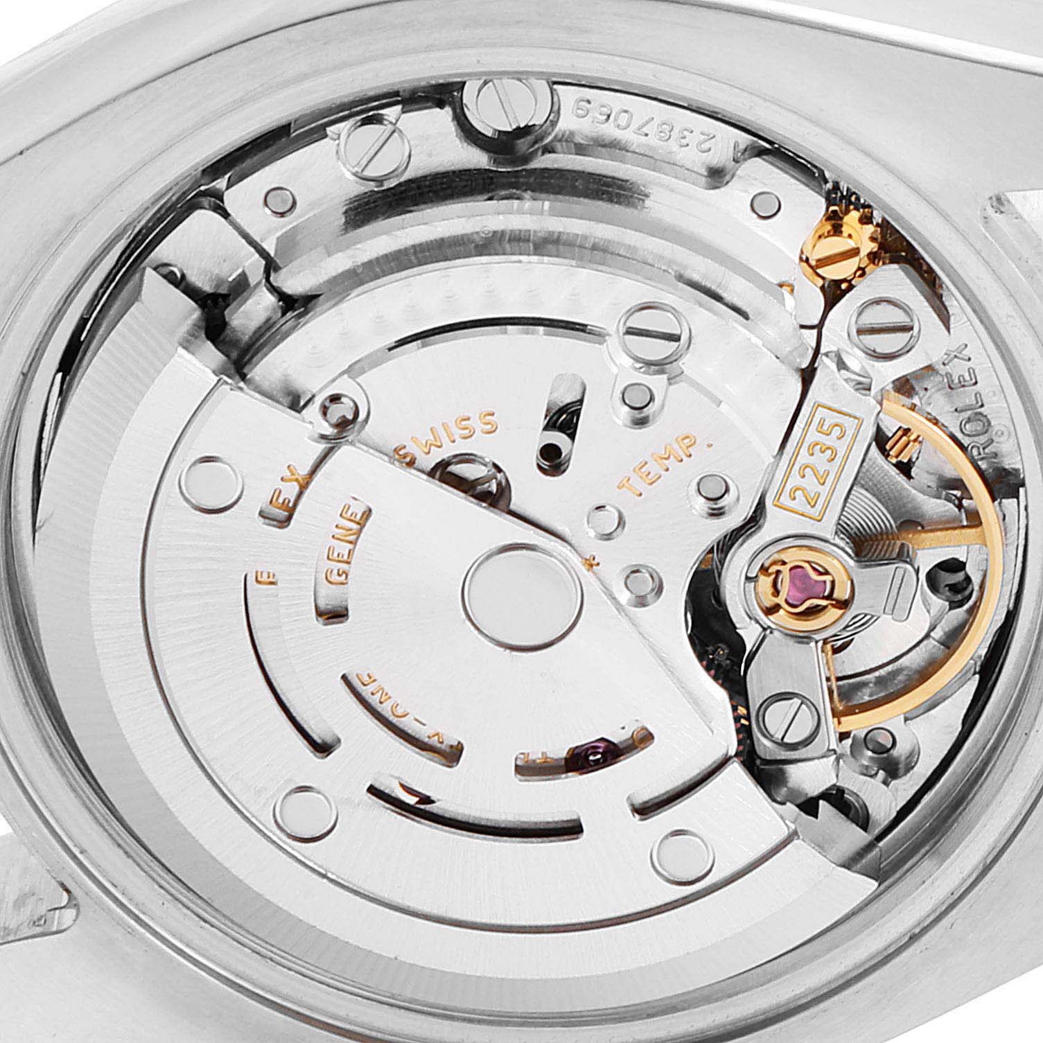 This image shows the internal mechanism of a Rolex Datejust 179171 Women
s Steel and Gold (two tone) Pink Dial 179171 Women
s Steel and Gold (two tone) Pink Dial watch from a close-up angle.