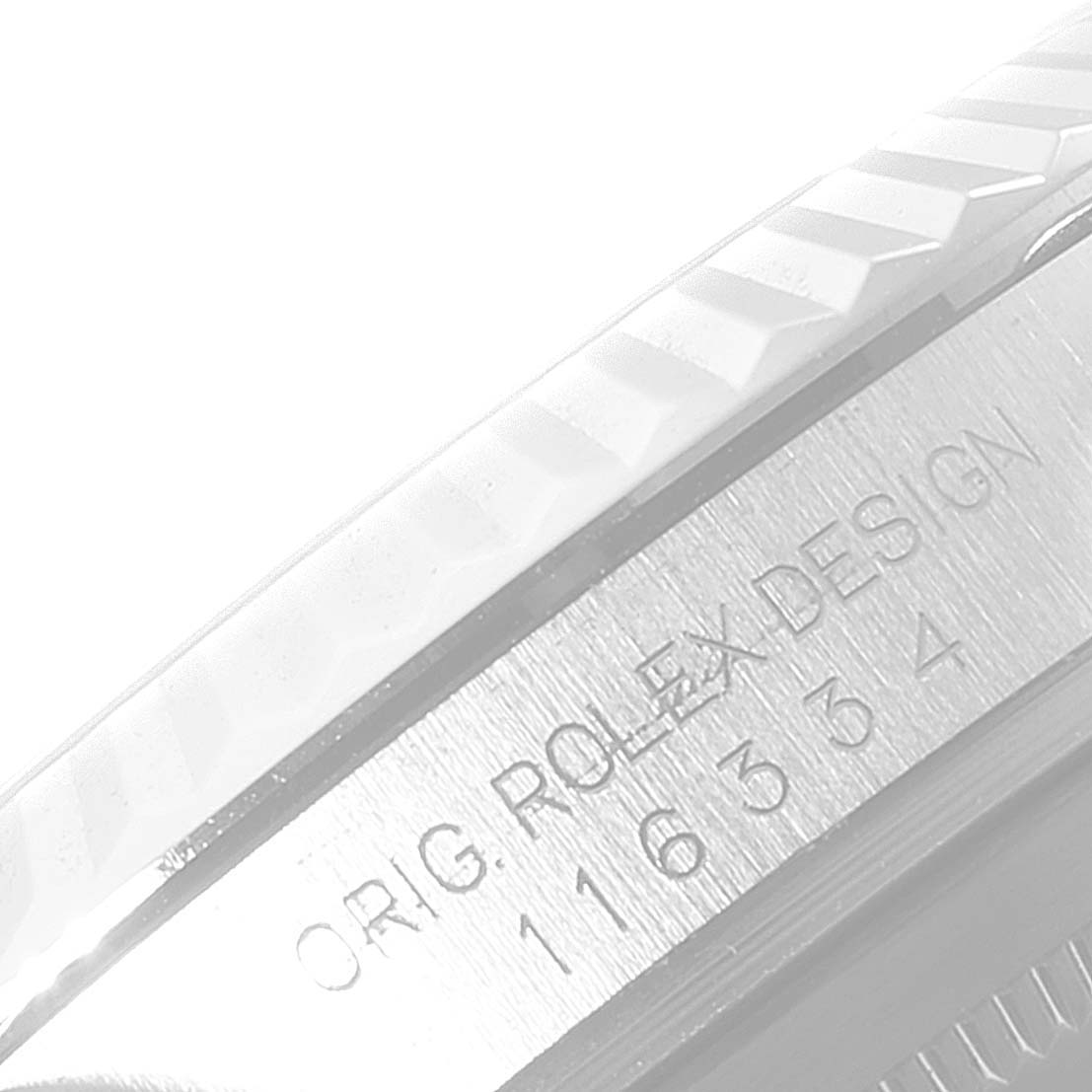 This image shows a close-up angled view of the case side engraving on a Rolex Datejust 41 116334 Men's Stainless Steel Black Dial 116334 Men's Stainless Steel Black Dial watch.