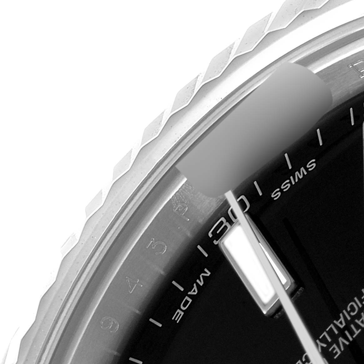 This image shows a close-up of the dial, bezel, and part of the minute hand of a Rolex Datejust 41 116334 Men's Stainless Steel Black Dial 116334 Men's Stainless Steel Black Dial watch.