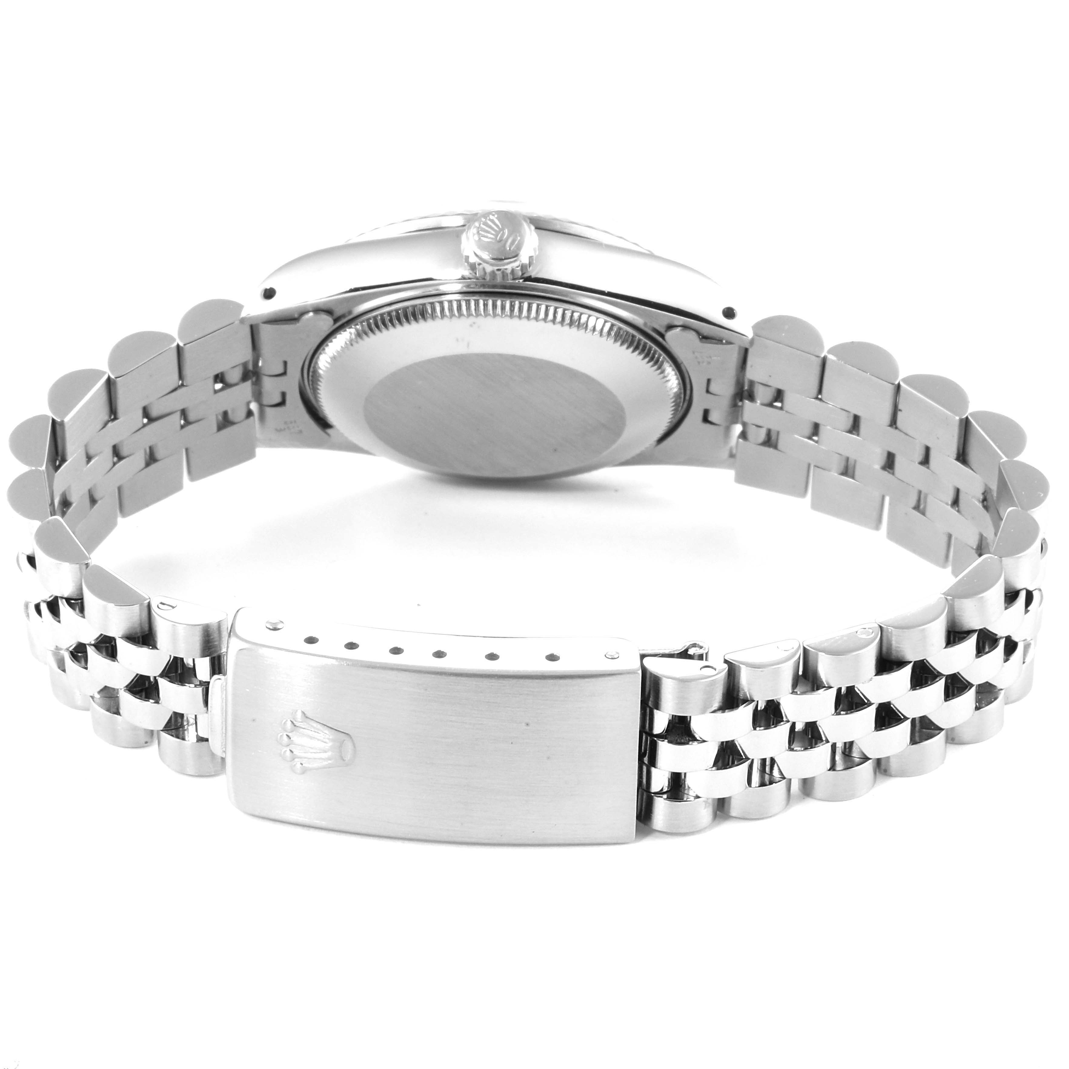 This image shows the back and clasp of a Rolex Mid-Size 68274 Women
s Stainless Steel Black Dial 68274 Women
s Stainless Steel Black Dial model watch, highlighting the stainless steel bracelet and case back.