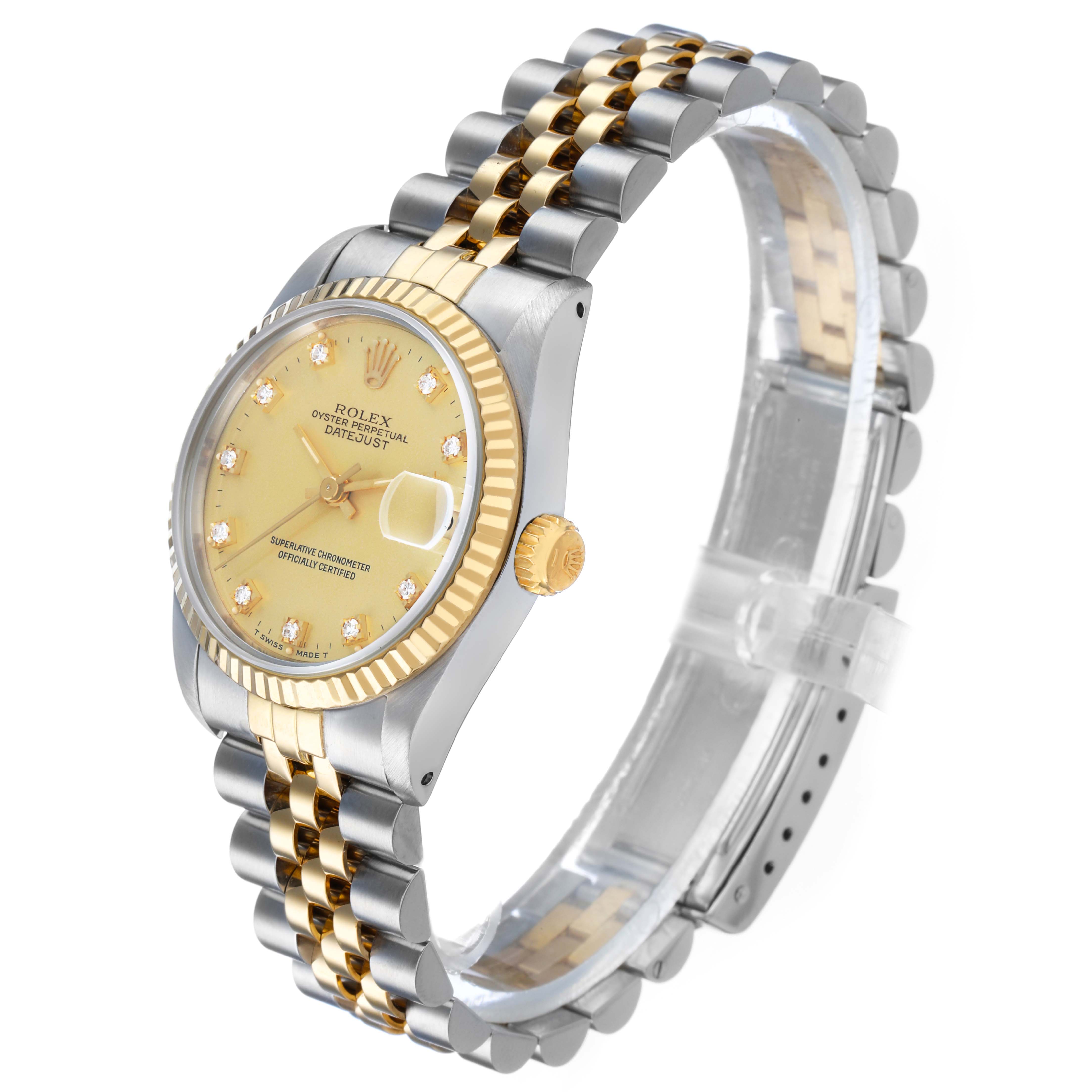 This Rolex Mid-Size 68273 Women's Steel and Gold (two tone) Champagne Dial Datejust is shown from an angled side view, highlighting the dial, bezel, crown, and bracelet.