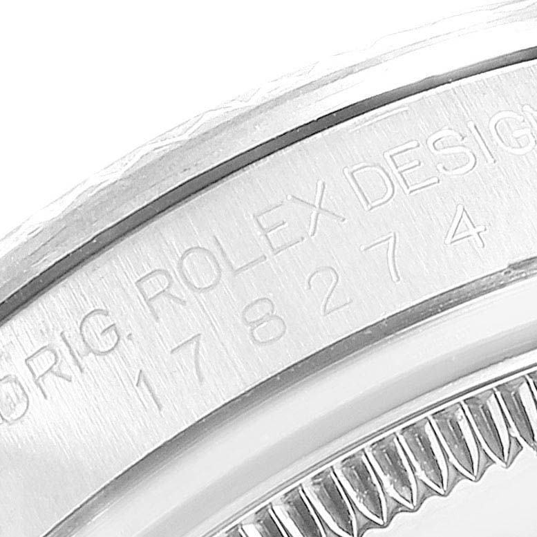 This image displays a close-up view of the case side and bezel of a Rolex Mid-Size 178274 Women
s Stainless Steel Silver Dial 178274 Women
s Stainless Steel Silver Dial model watch.