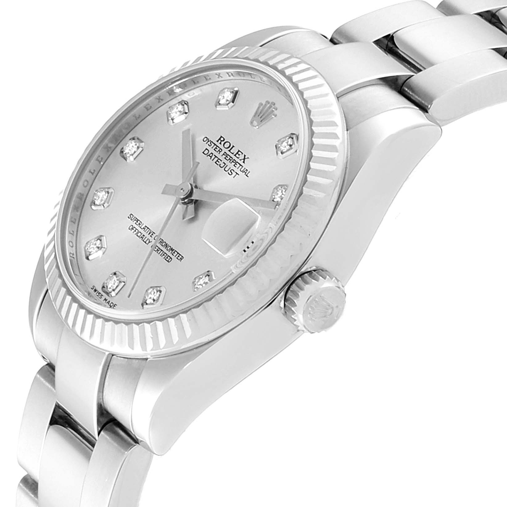 This image shows a Rolex Mid-Size 178274 Women
s Stainless Steel Silver Dial 178274 Women
s Stainless Steel Silver Dial Datejust watch at an angle, highlighting the face, crown, bezel, and part of the bracelet.