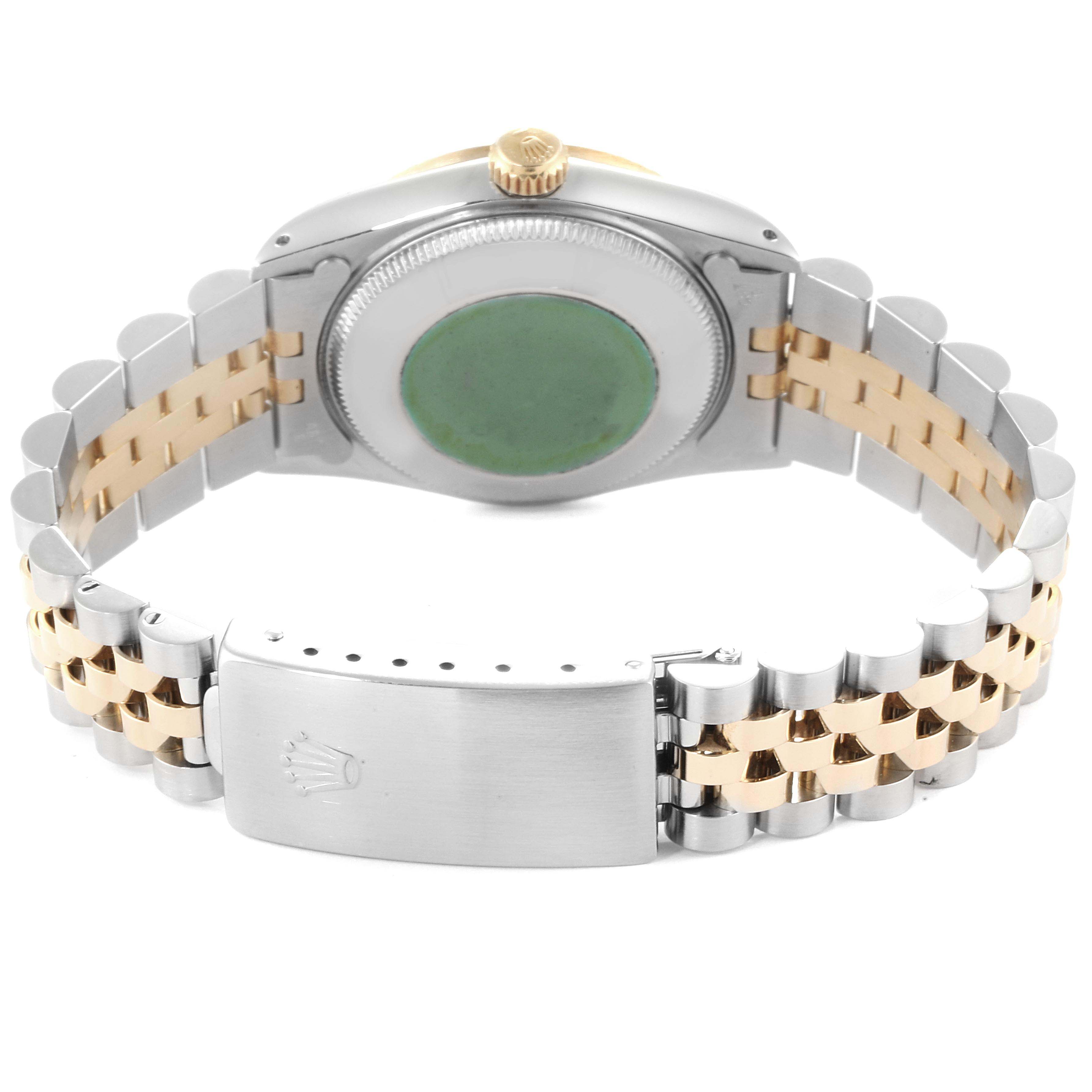 The image shows the back view of a Rolex Mid-Size 68273 Women
s Steel and Gold (two tone) Champagne Dial 68273 Women
s Steel and Gold (two tone) Champagne Dial watch, displaying the bracelet, clasp, and case back.