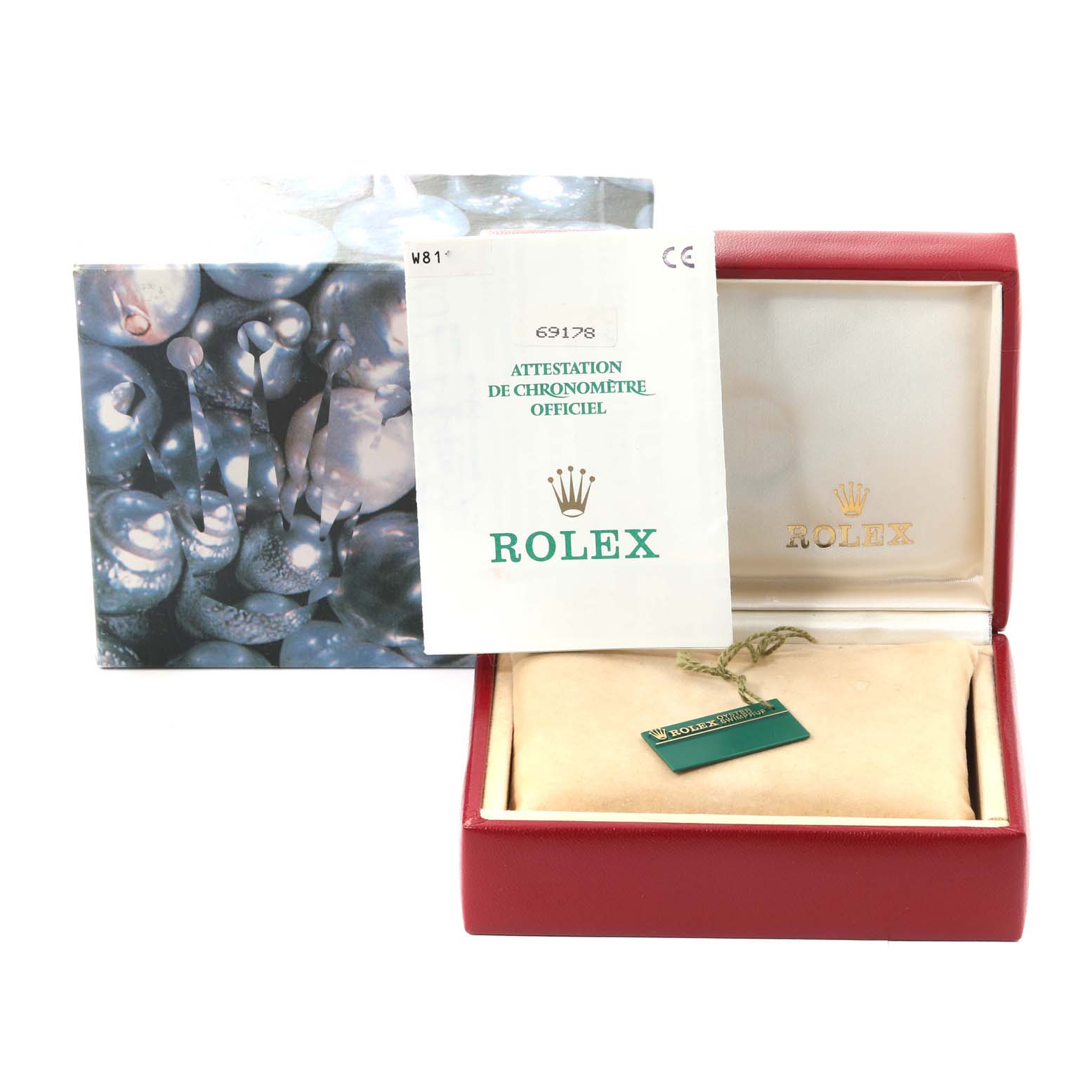 The image shows a Rolex President 69178 Women's Yellow Gold Champagne Dial 69178 Women's Yellow Gold Champagne Dial model watch box, papers, a tag, and an official chronometer certification.