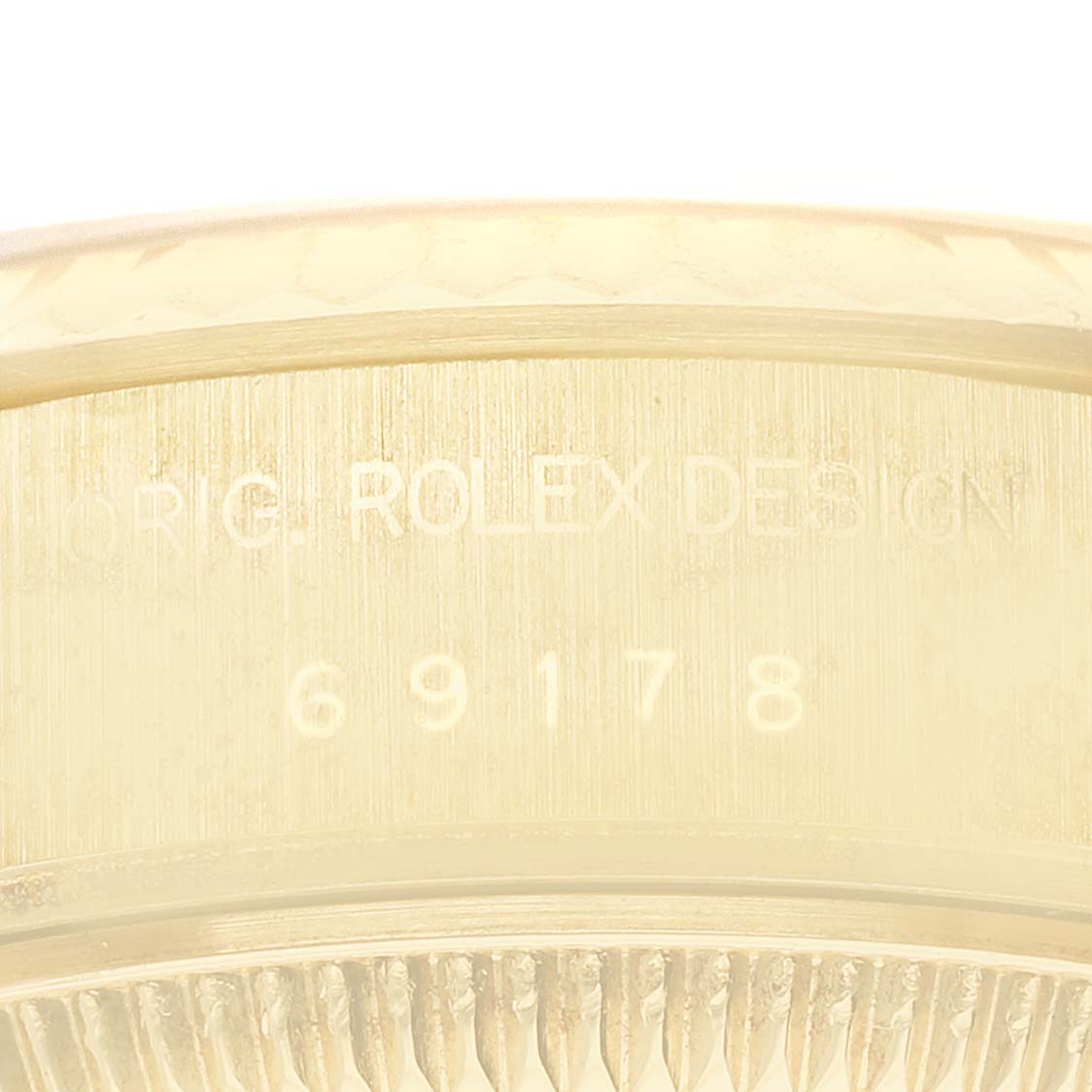 The image shows a close-up of the case edge with the model number "69178" and "Rolex Design" engraving on a Rolex President 69178 Women's Yellow Gold Champagne Dial 69178 Women's Yellow Gold Champagne Dial watch.