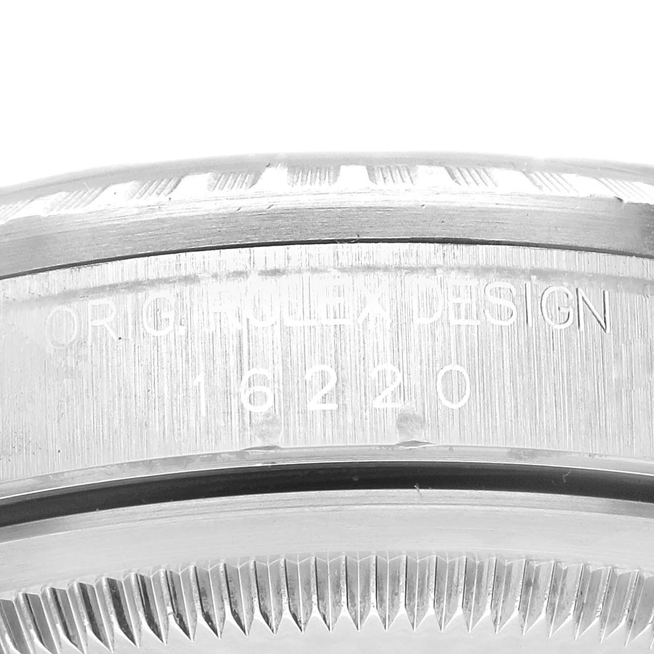This image shows a close-up of the side case and bezel with engravings on the Rolex Datejust 16220 Men's Stainless Steel Silver Dial 16220 Men's Stainless Steel Silver Dial model.