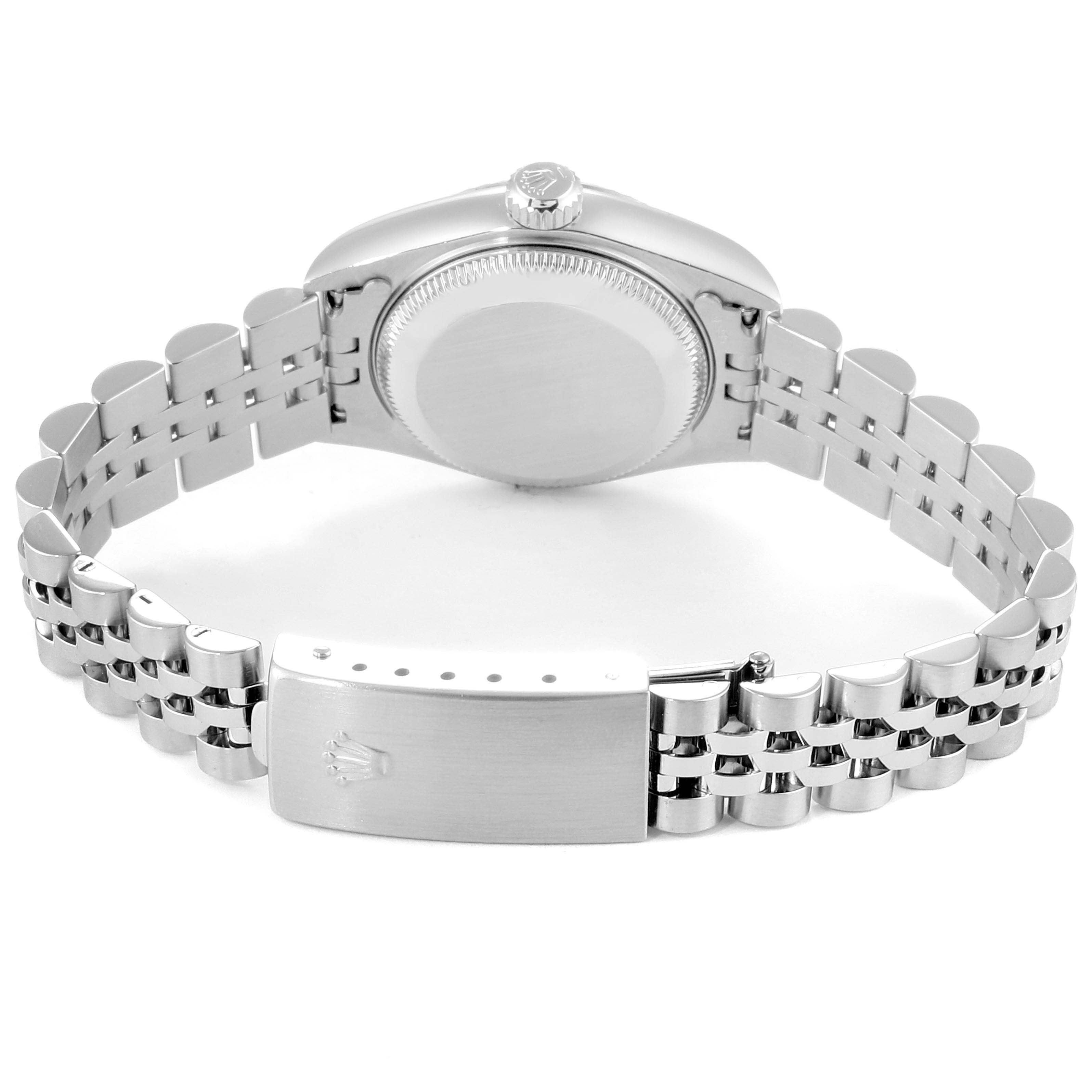 The image shows the back view of a Rolex Datejust 79174 Women
s Stainless Steel Pink Dial 79174 Women
s Stainless Steel Pink Dial watch, highlighting the case back, crown, and Jubilee bracelet with clasp.