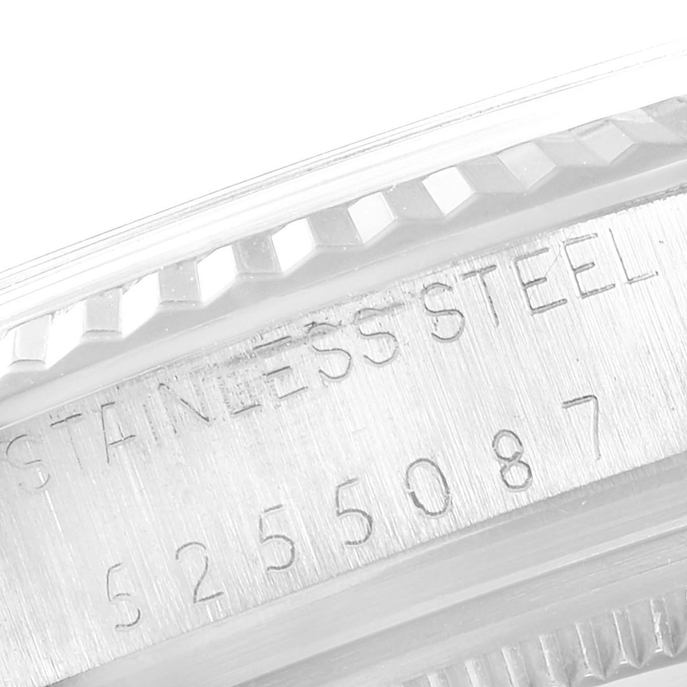 The image shows a close-up of the stainless steel casing and serial number of the Rolex Vintage Collection 16014 Men
s Stainless Steel Silver Dial 16014 Men
s Stainless Steel Silver Dial model.