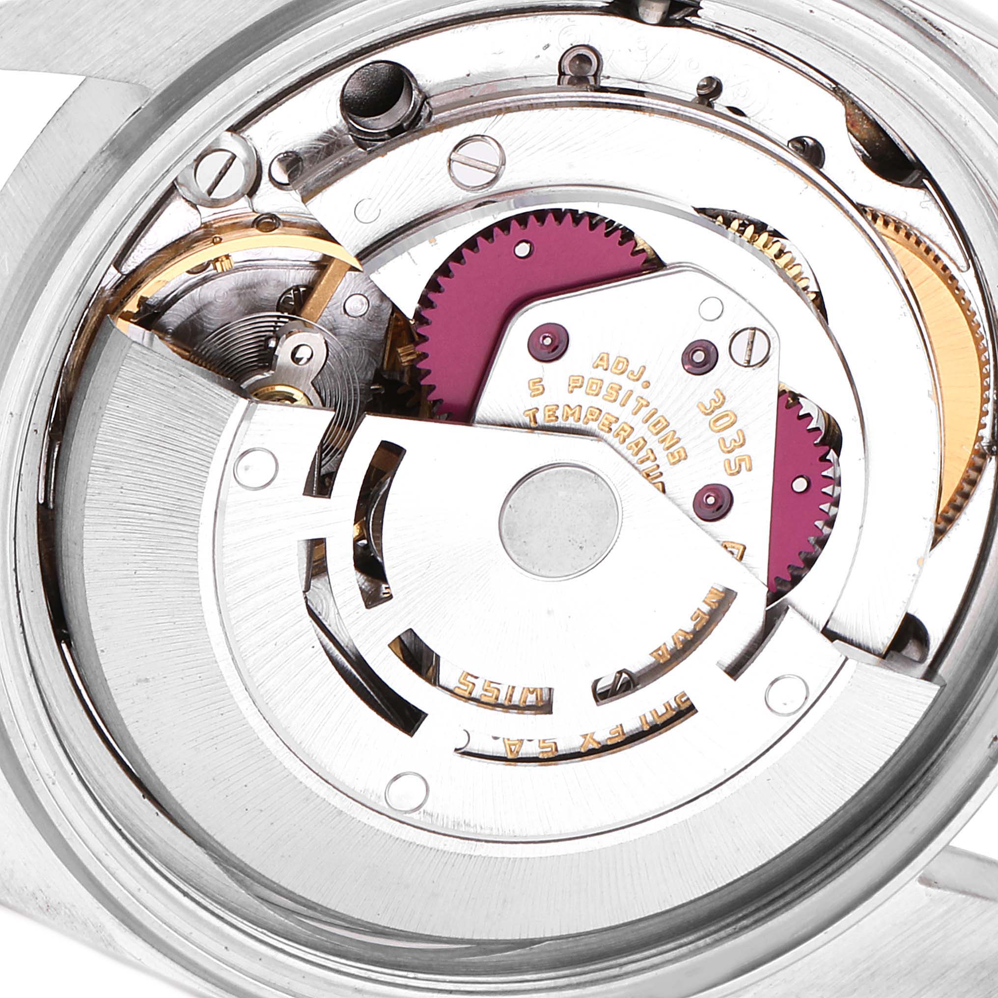 This image shows the inner mechanism of the Vintage Collection model by Rolex, highlighting gears and intricate components.