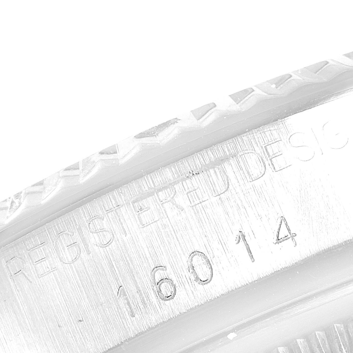 This image shows a close-up of the model number "16014" and "REGISTERED DESIGN" engraving on the case of a Vintage Collection Rolex watch.