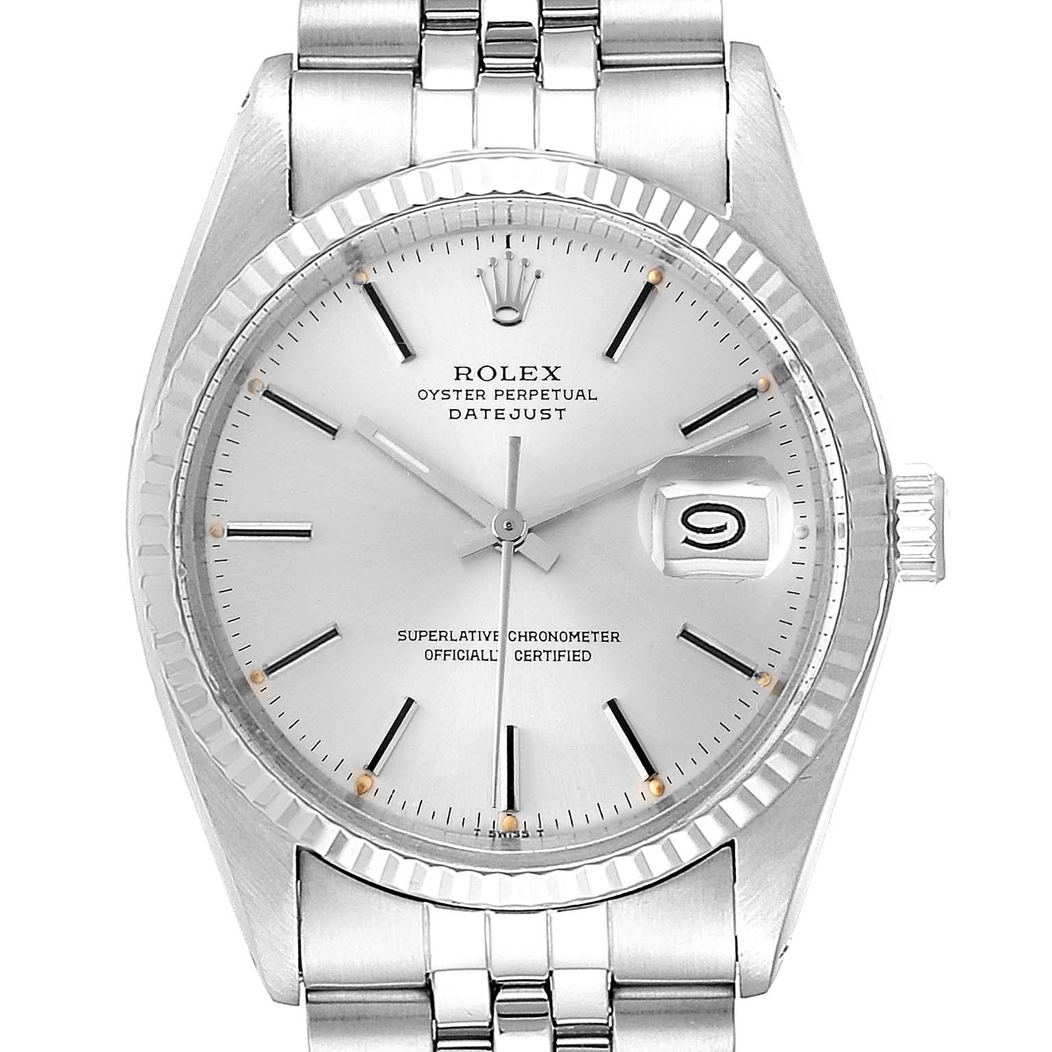 The image shows a close-up view of the face and bracelet of a Rolex Vintage Collection 16014 Men
s Stainless Steel Silver Dial 16014 Men
s Stainless Steel Silver Dial Datejust watch.