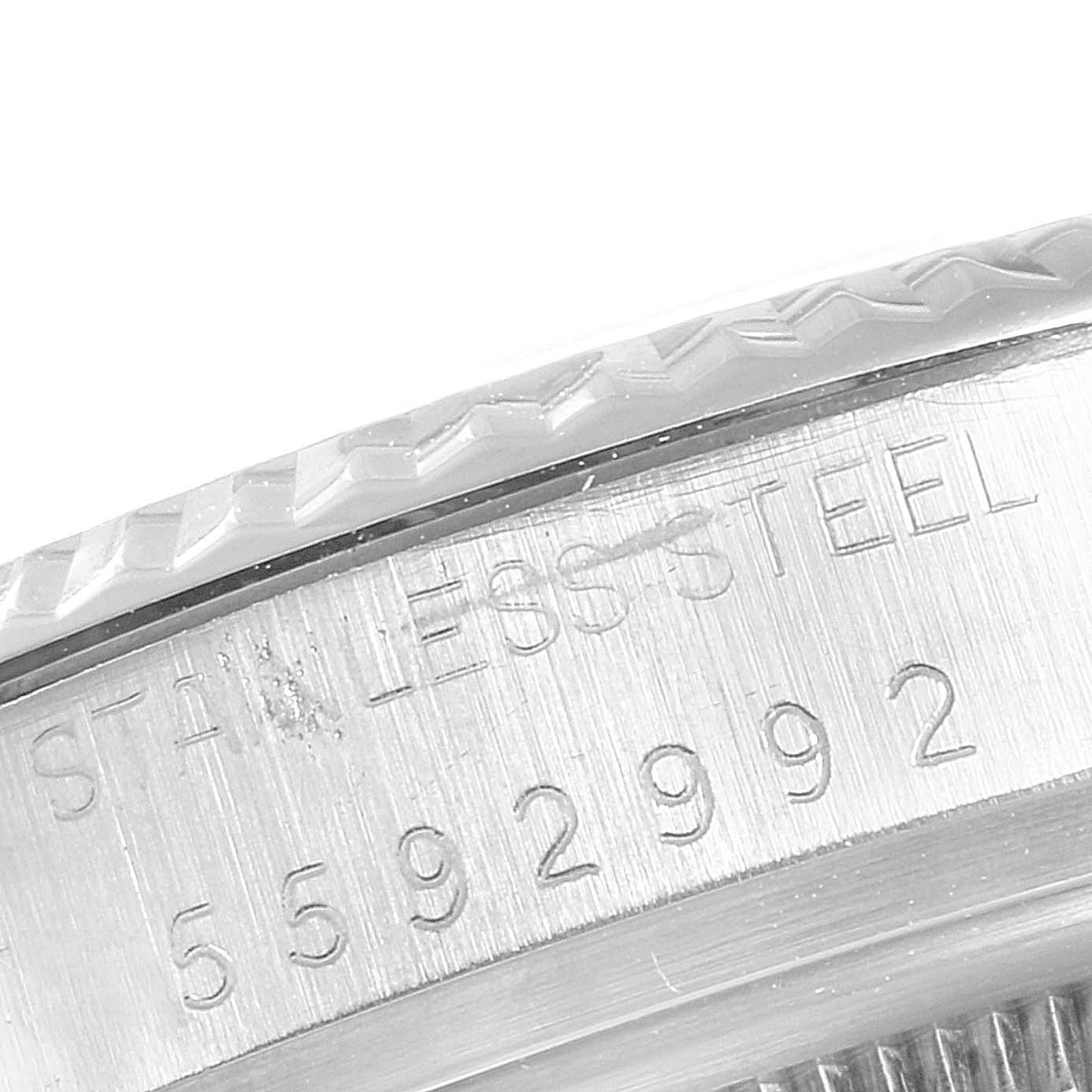 This close-up image shows the case side and serial number engraving on a Rolex Vintage Collection 16014 Men
s Stainless Steel Silver Dial 16014 Men
s Stainless Steel Silver Dial model watch.