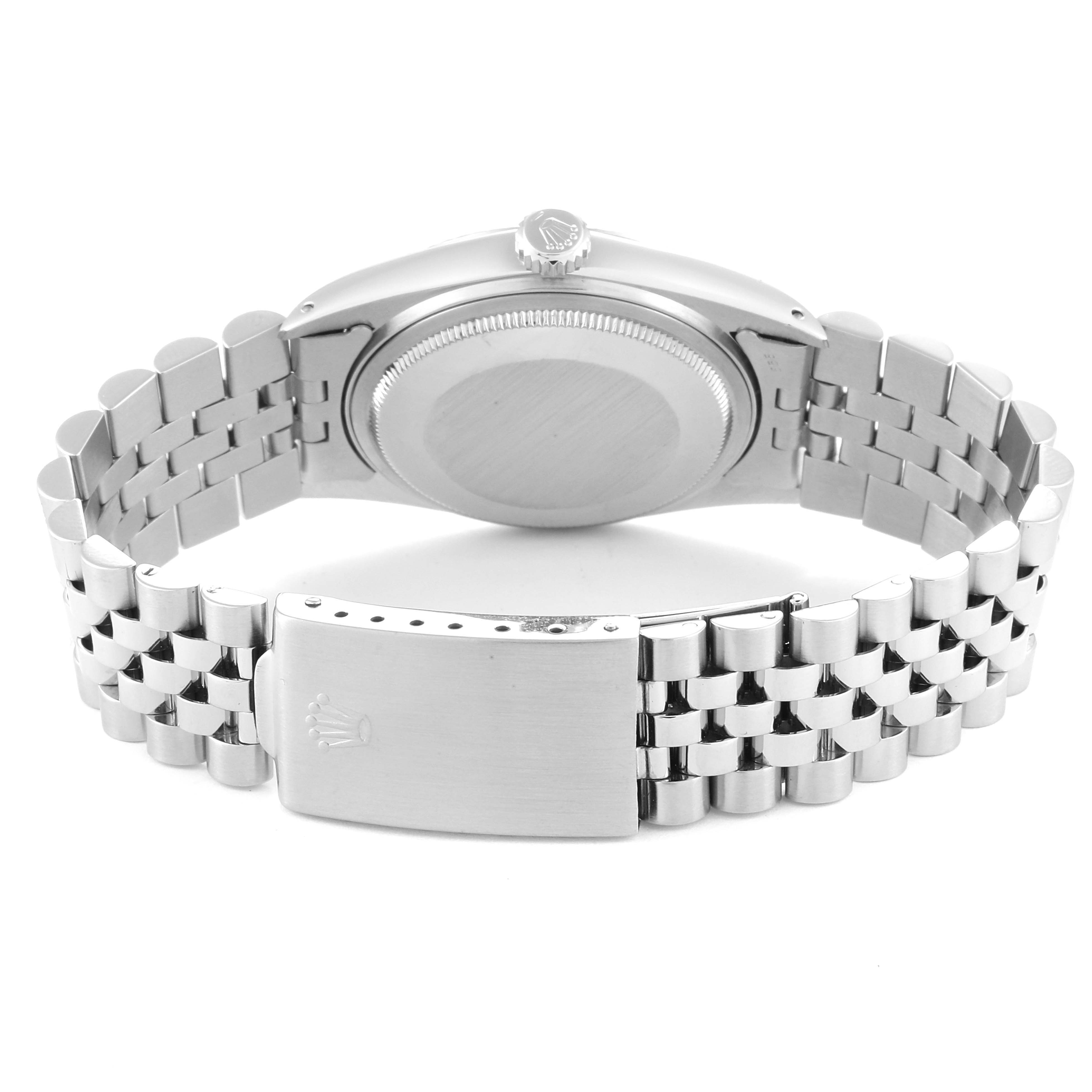 The image shows the back view of a Rolex Vintage Collection 16014 Men
s Stainless Steel Silver Dial 16014 Men
s Stainless Steel Silver Dial watch, highlighting the case back, crown, and bracelet clasp.