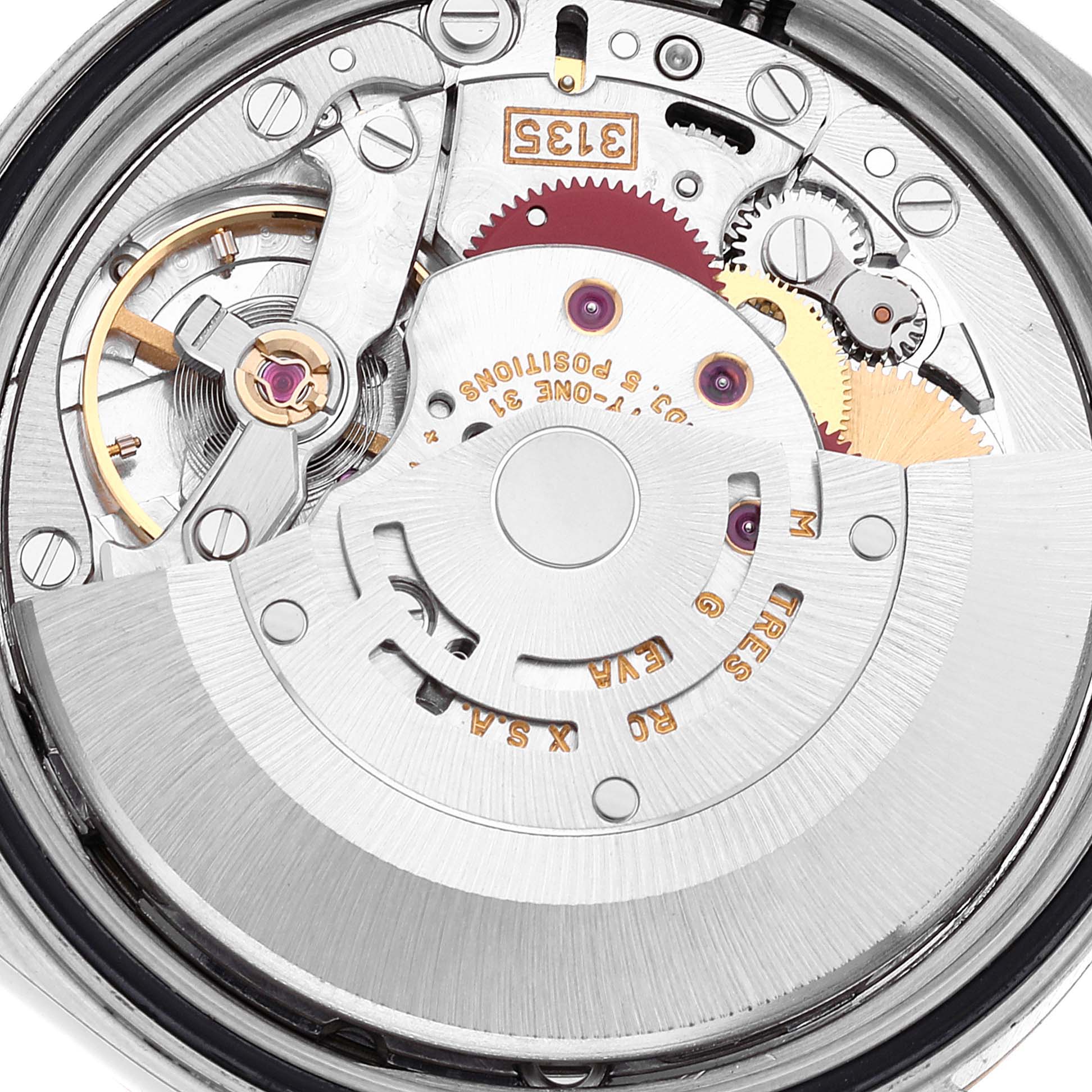 This image shows a close-up of the intricate internal mechanism of a Rolex Datejust 16233 Men's Steel and Gold (two tone) Blue Dial 16233 Men's Steel and Gold (two tone) Blue Dial model watch.