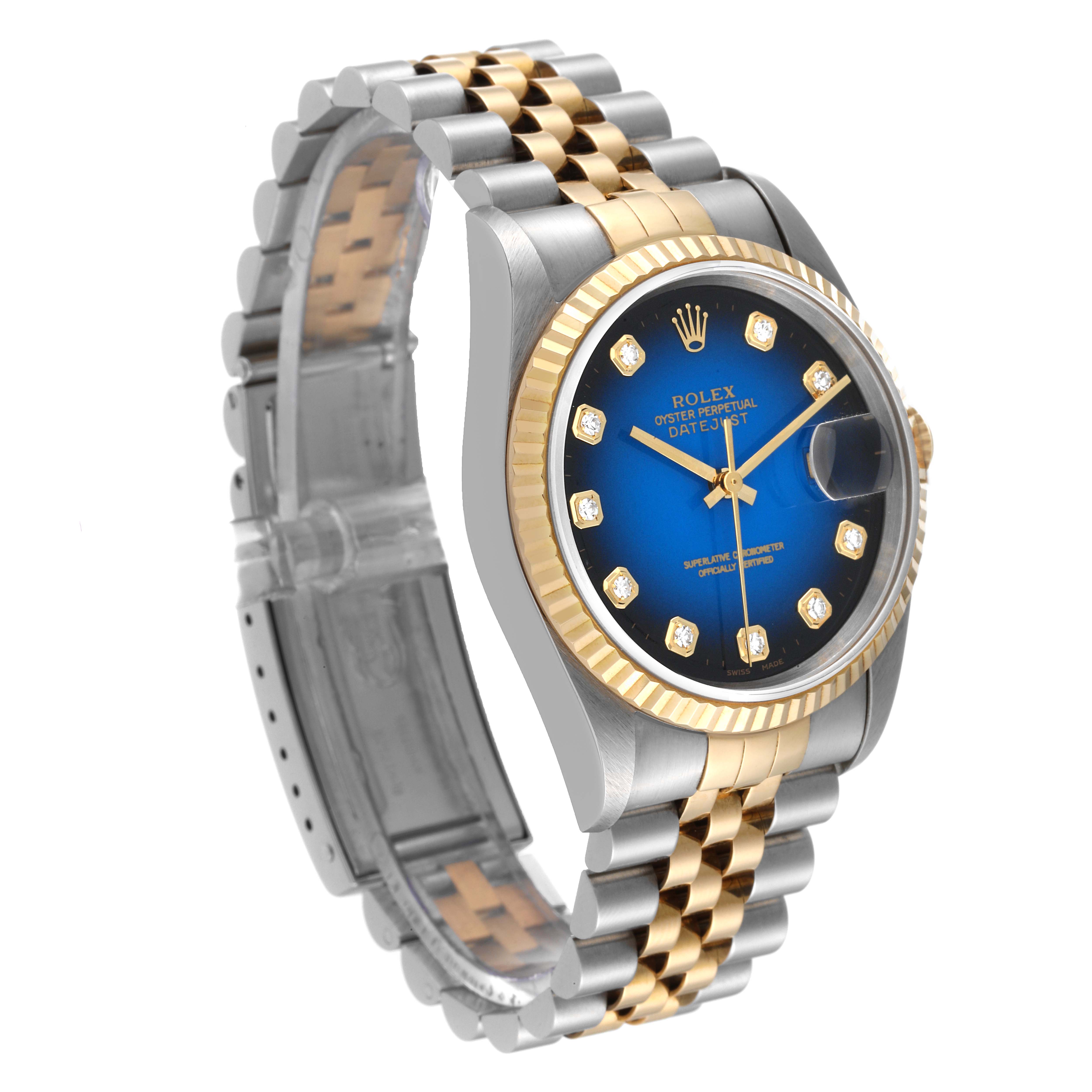 The image shows a Rolex Datejust 16233 Men's Steel and Gold (two tone) Blue Dial 16233 Men's Steel and Gold (two tone) Blue Dial watch at a slight angle, highlighting its two-tone bracelet, blue dial, and fluted bezel.