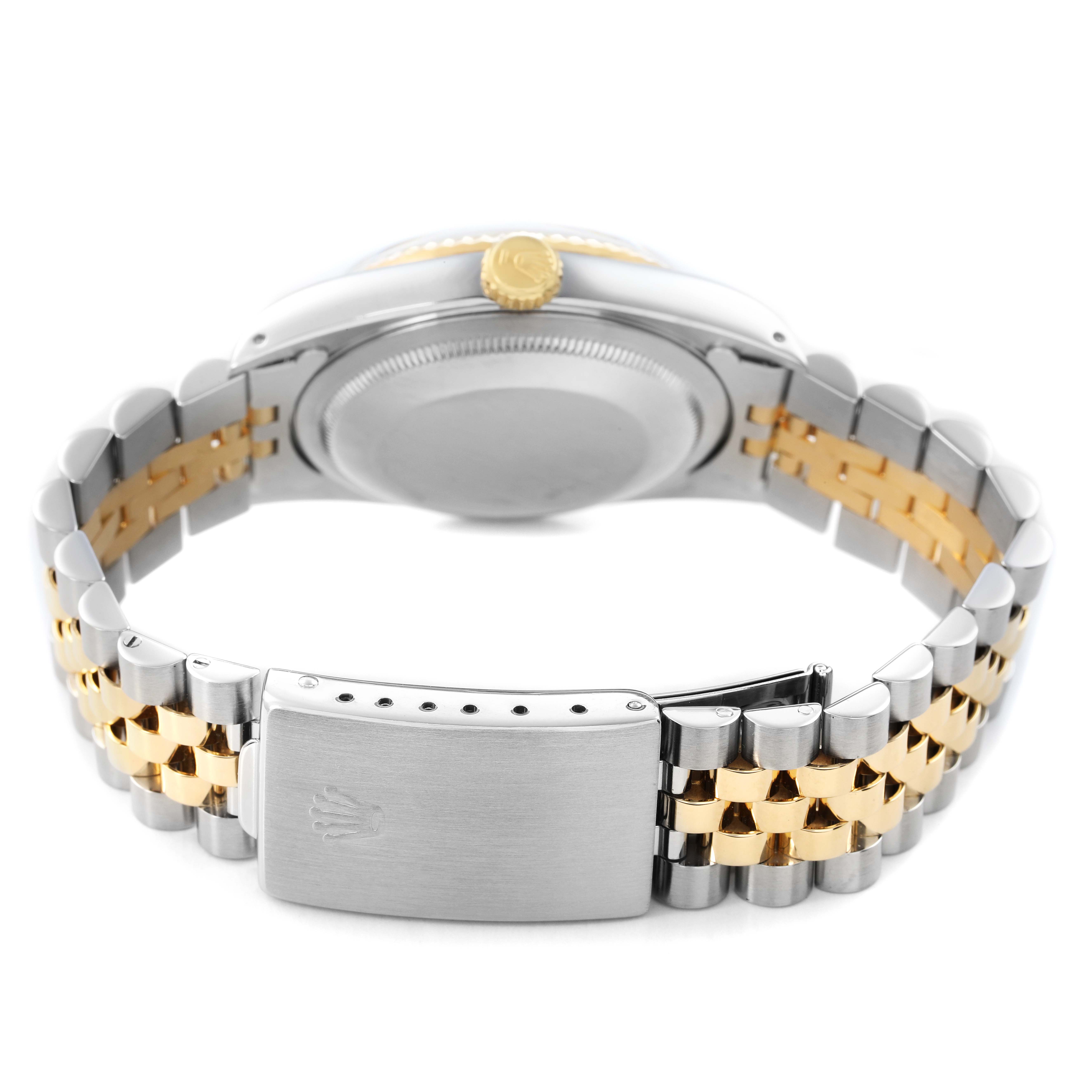 The Rolex Datejust 16233 Men's Steel and Gold (two tone) Champagne Dial watch is shown from the back, highlighting the case, crown, and two-tone Jubilee bracelet.