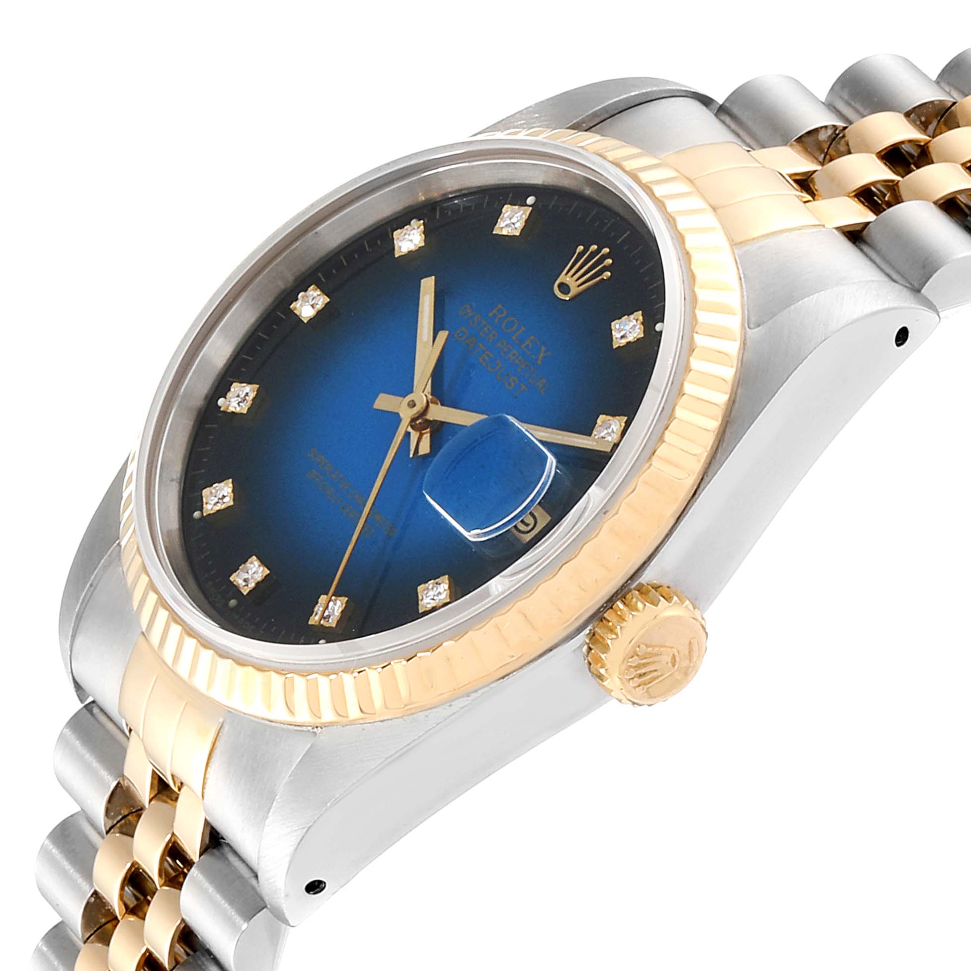 The image shows a Rolex Datejust 16233 Men
s Steel and Gold (two tone) Blue Dial 16233 Men
s Steel and Gold (two tone) Blue Dial watch from an angled perspective, highlighting the blue dial, fluted bezel, Jubilee bracelet, and crown.