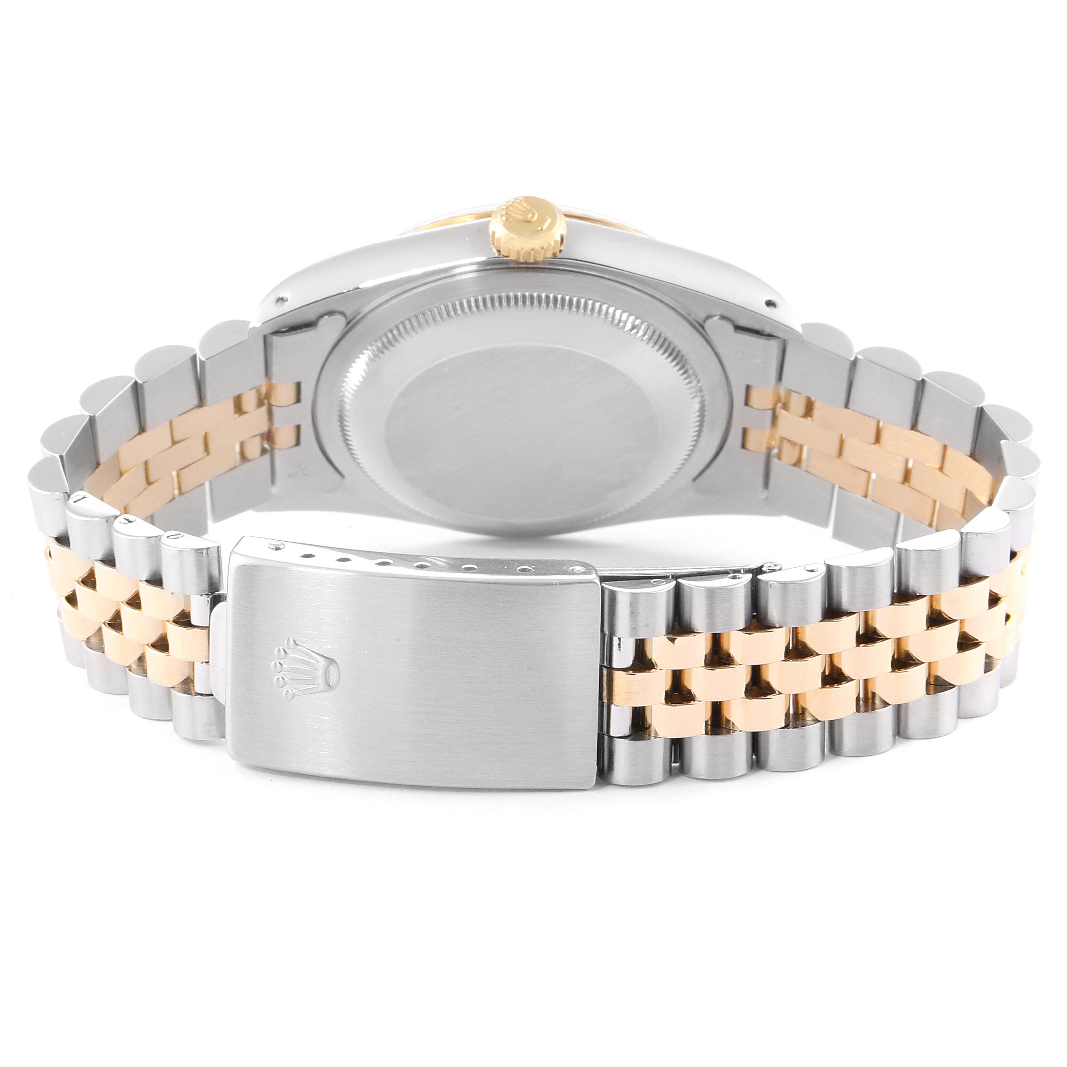 The image shows the back case and two-tone bracelet of the Rolex Datejust 16233 Men
s Steel and Gold (two tone) Silver Dial 16233 Men
s Steel and Gold (two tone) Silver Dial watch from a rear angle.